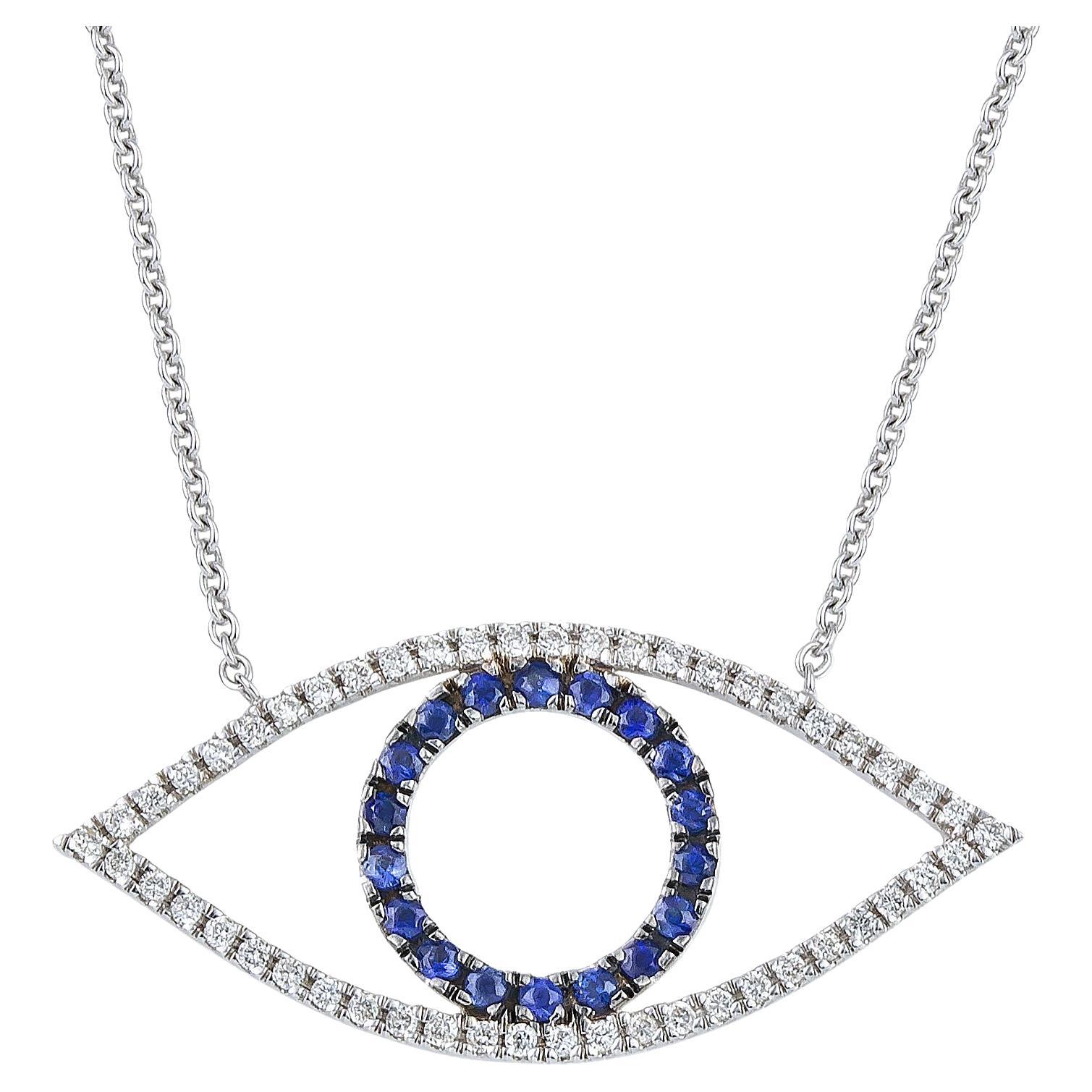 Collier pendentif grec œil maléfique en or blanc 18 carats avec diamants et saphir bleu en vente