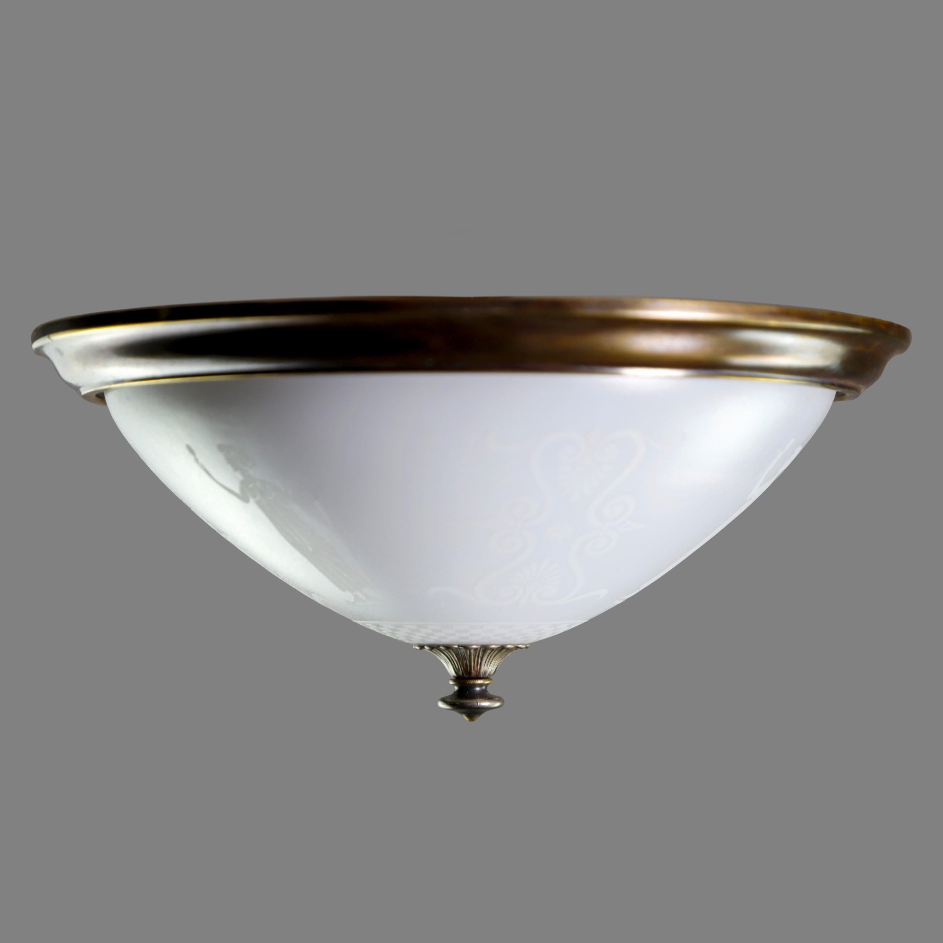White glass flush mount dome shaped light with a bronze frame and finial. The glass is decorated with ornate and Greek figural designs. This takes two E-26 bulbs. Cleaned and restored. Small quantity available at time of posting. Please inquire.