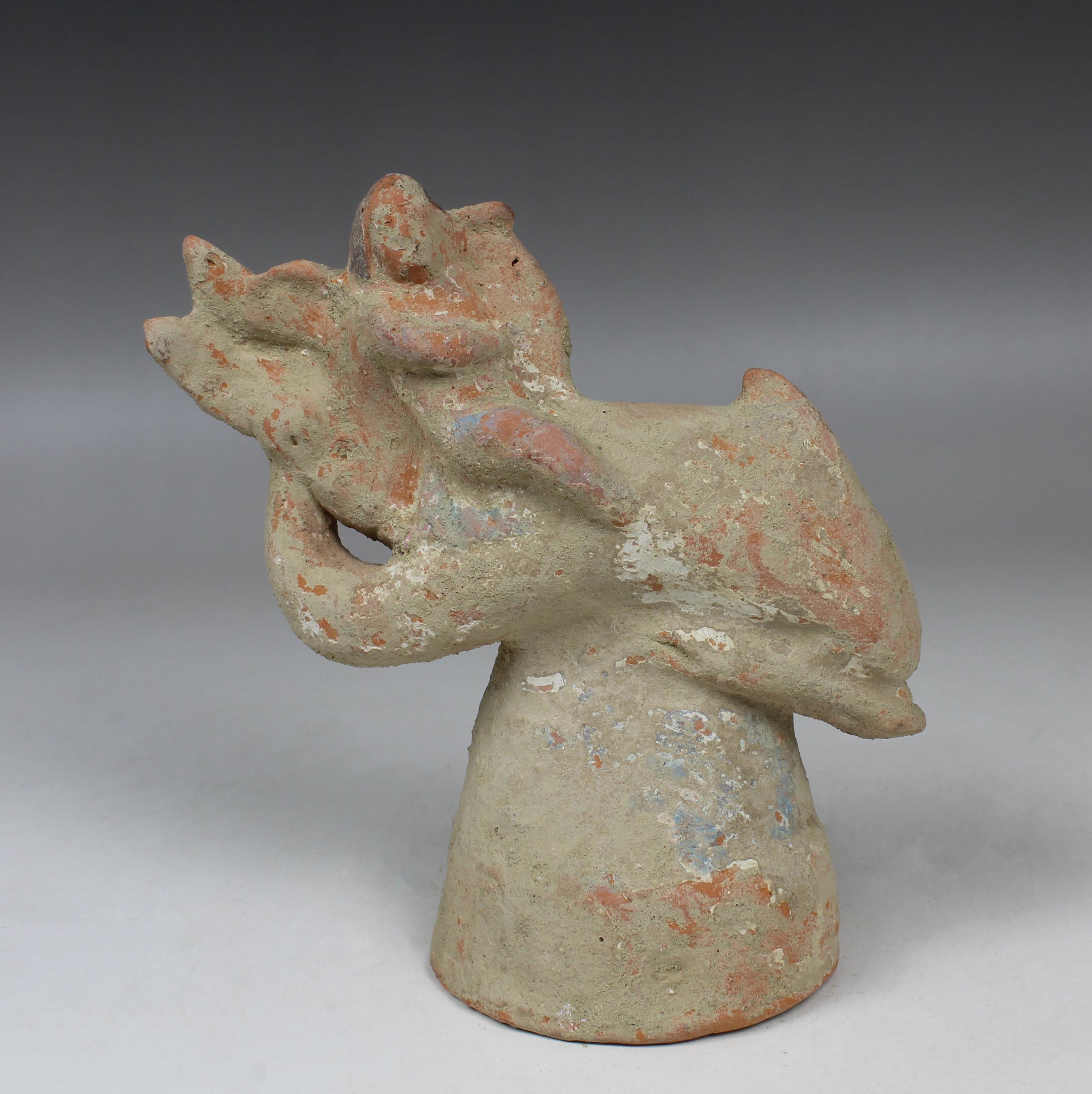 ITEM: Figurine of a little Eros riding on a dolphin, holding a lyre with remains of polychromy
MATERIAL: Pottery
CULTURE: Greek
PERIOD: 4th – 3rd Century B.C
DIMENSIONS: 145 mm x 140 mm x 65 mm
CONDITION: Good condition
PROVENANCE: Ex American