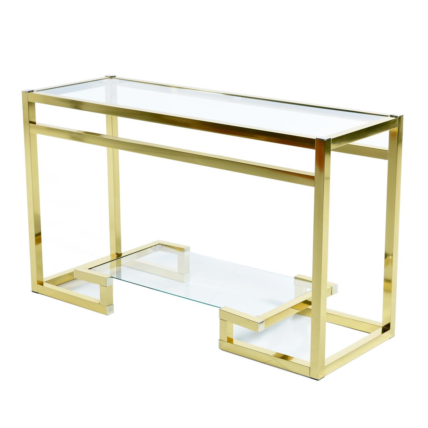 Vintage late 1970s-early 1980s gold Asian-modern meets neo-deco brass / gold colored aluminum console and matching mirror. Combine gilded age glamour with the clean lines and sculptural edge of modern-day design and you get the ever-intriguing