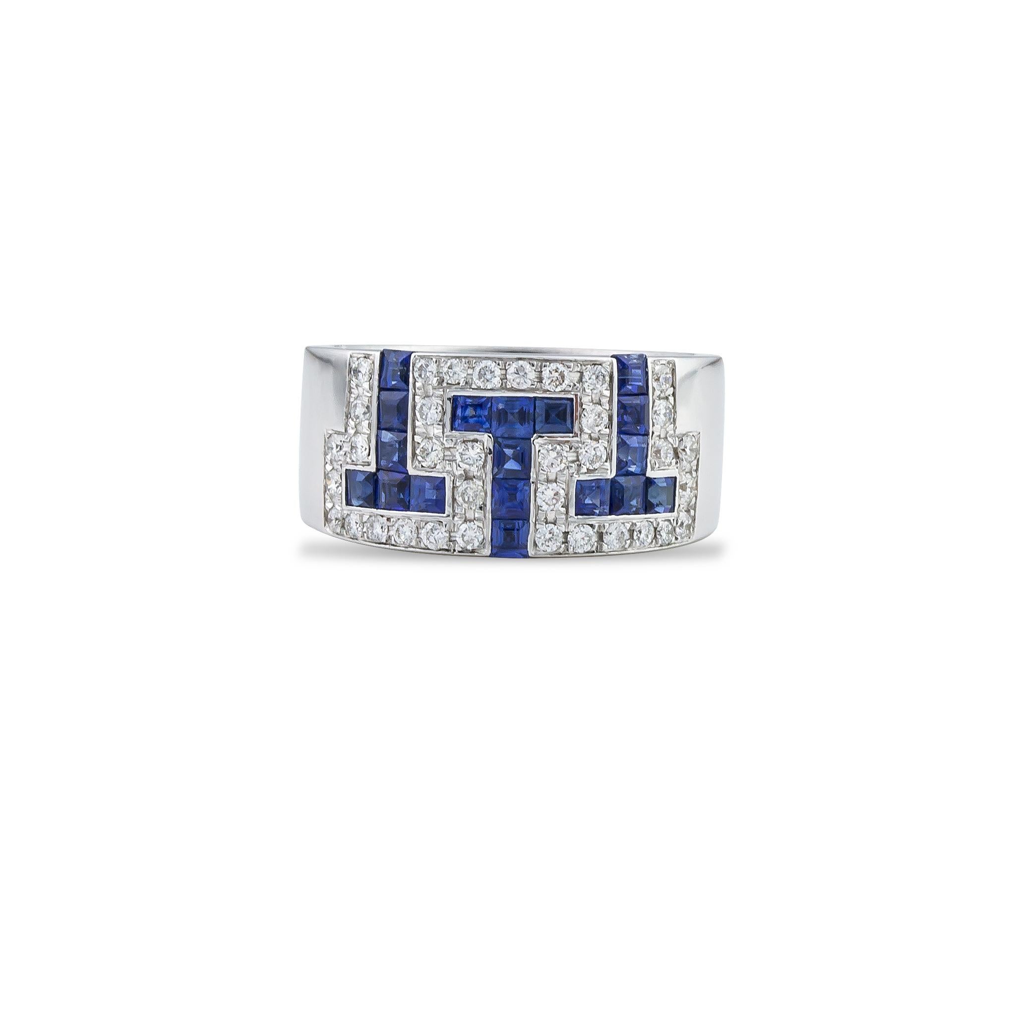 Greek Key Meander ring handcrafted in 18Kt white gold. Scintillating square cut blue Sapphires race the bold form of the Greek key - meander  in this striking and classic design. The white brilliant cut diamonds around the sapphires reflect the