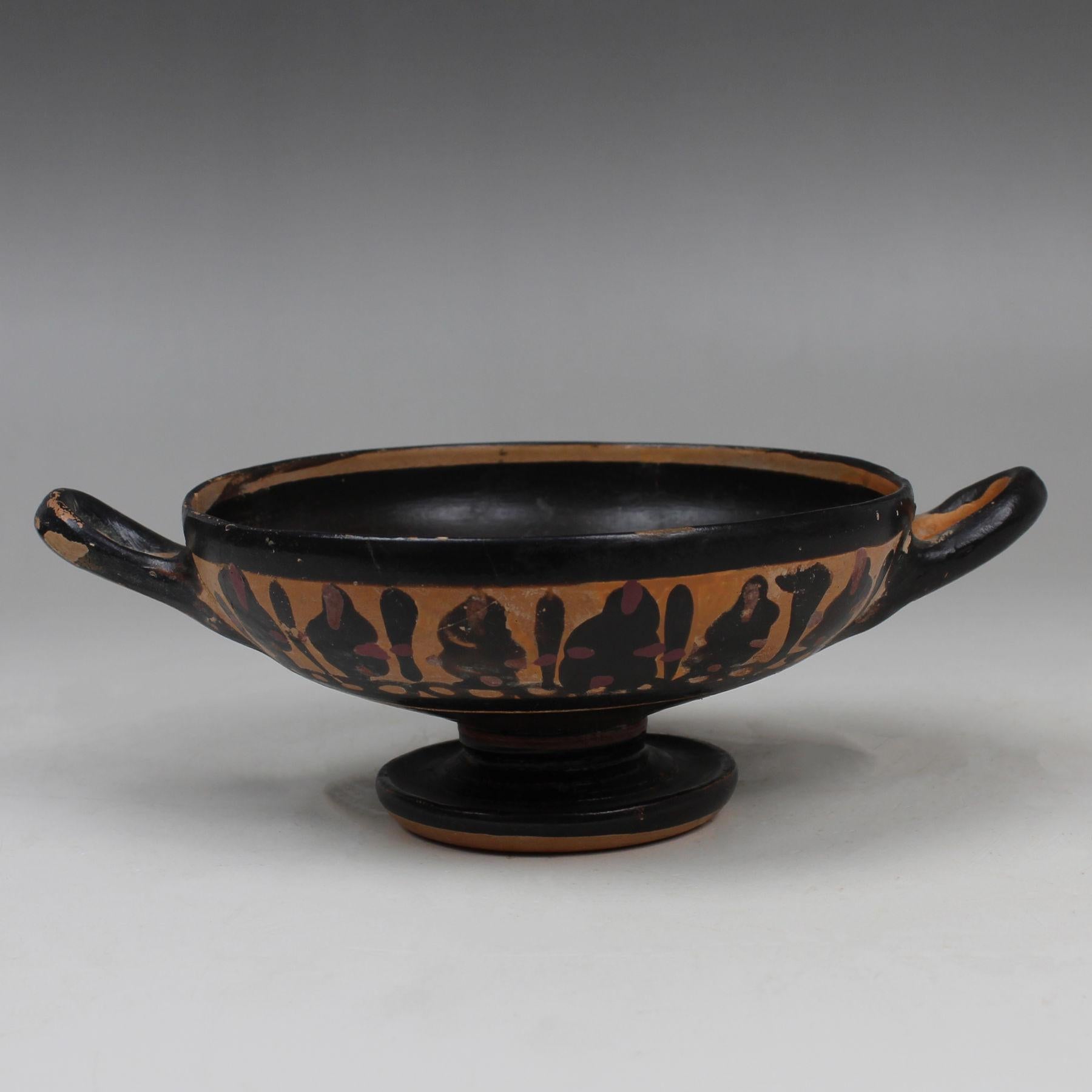 ITEM: Kylix
MATERIAL: Pottery
CULTURE: Greek, Apulian
PERIOD: 4th Century B.C
DIMENSIONS: 56 mm x 165 mm x 115 mm
CONDITION: Good condition
PROVENANCE: Ex Belgian private collection, acquired from Christophe Varosi Gallery, Brussels in 2001

Comes