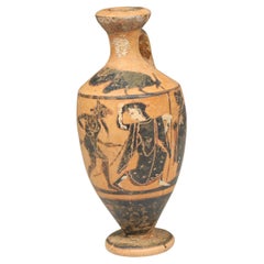 Greek lekythos, Cock Group, depicting a mincing satyr and maenad between two dra