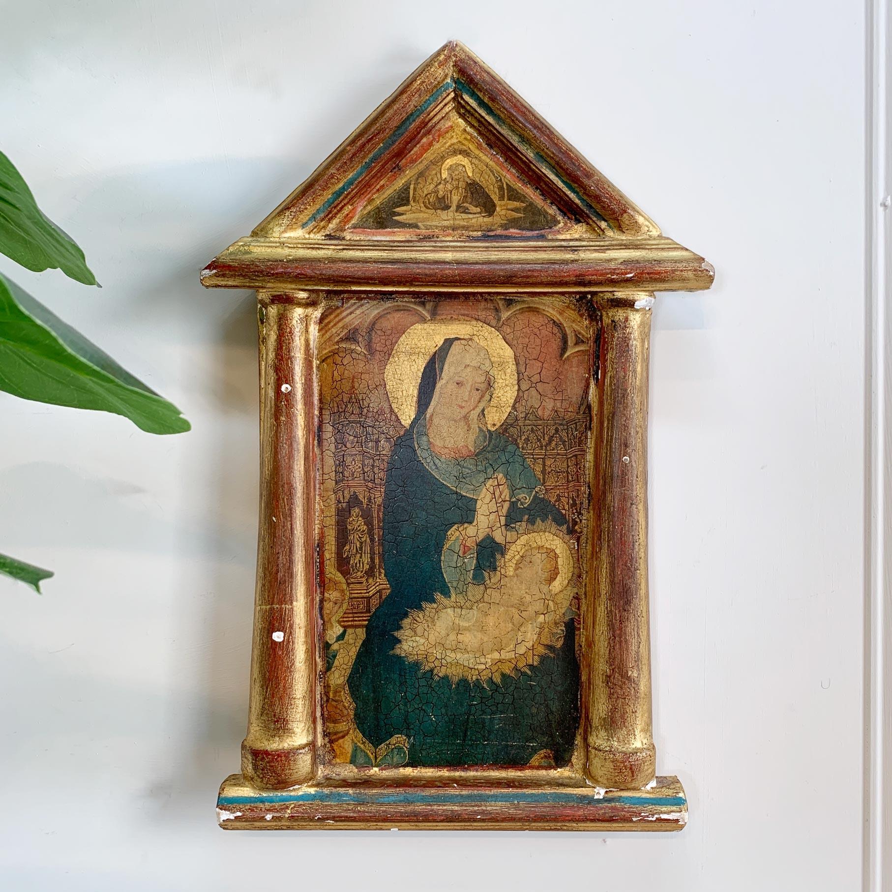 Late 19th century Icon painting on wood, the arched frame with applied gesso and gilt. The beautifully painted image is of The Virgin Mary, holding the infant Jesus.

We believe this is a Greek Orthodox Icon, although it could possibly be