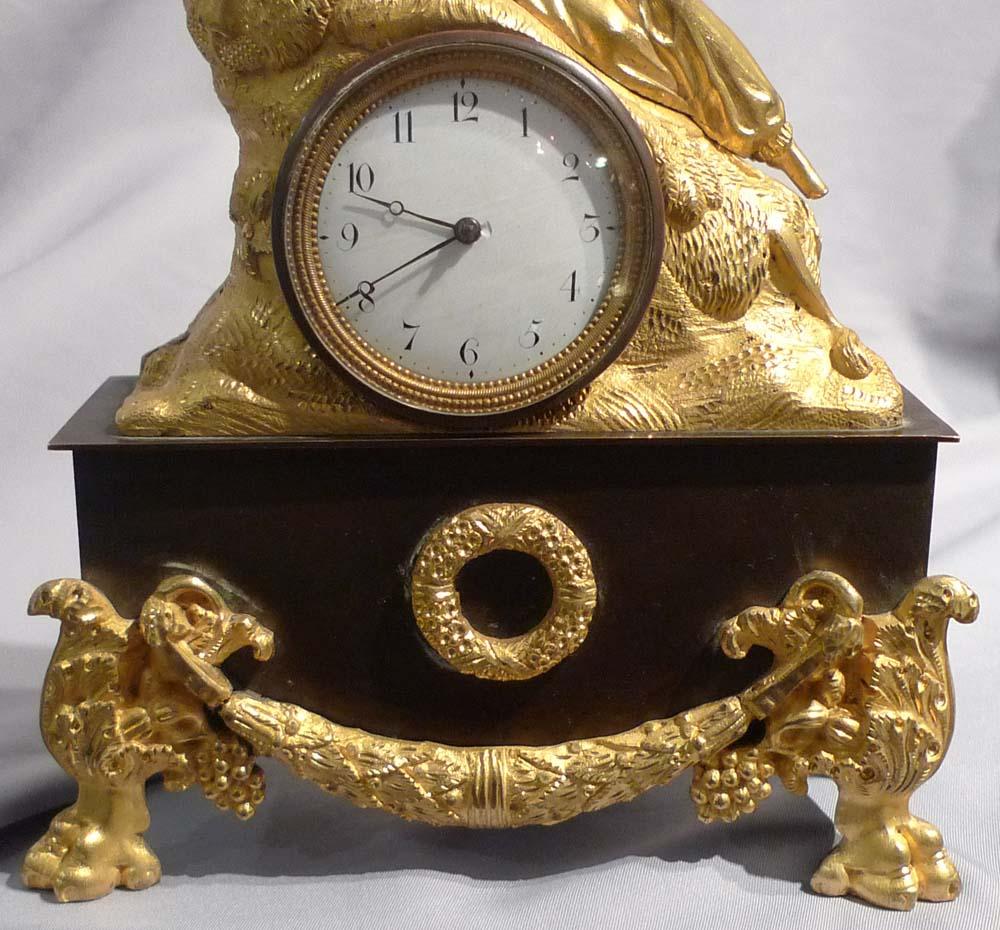 Greek Revolution or Hellenistic clock of Marmaluke. Constructed of patinated bronze and ormolu, the fire gilt/mercury gilding in excellent original condition. The Marmaluke is laying on an animal skin blanket, wearing a turban with a blue jewel to