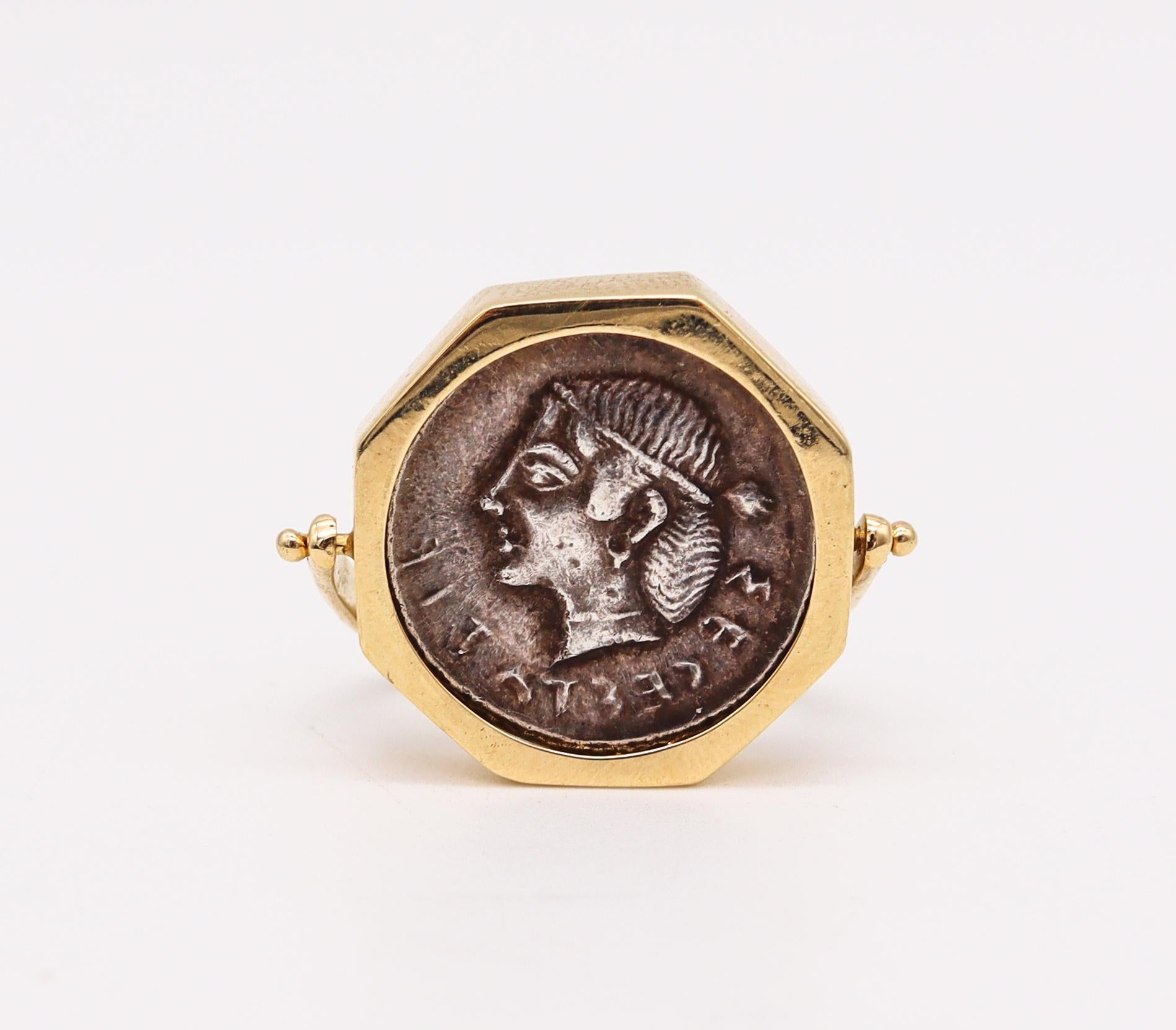 Signet flip ring with an ancient coin from Segesta city.

Fabulous coin signet ring, crafted with ancient flip technique in solid yellow gold of 18 karats with high polished finish. It is mounted with a very rare, genuine and authentic ancient Greek