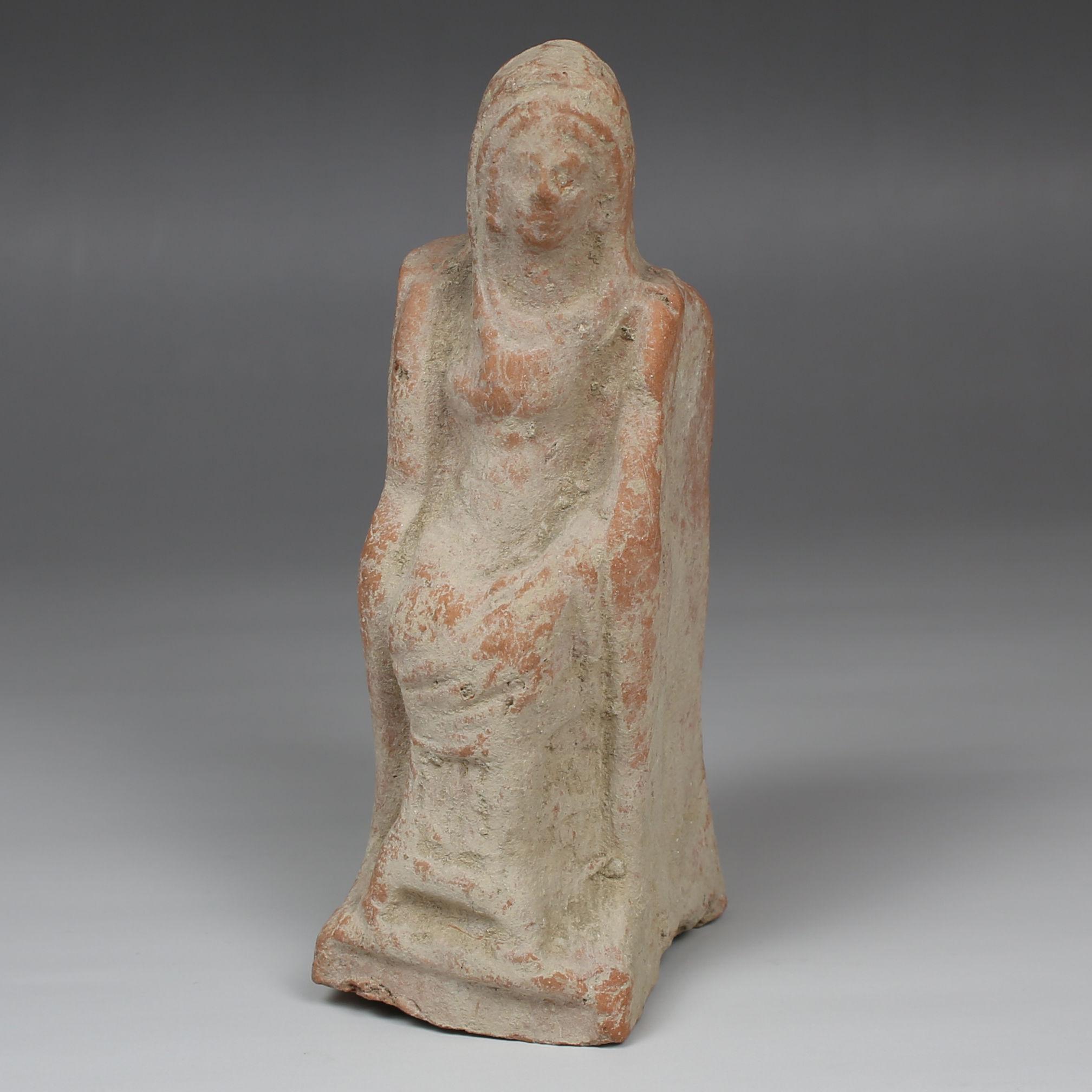 ITEM: Statuette of an enthroned woman
MATERIAL: Pottery
CULTURE: Greek, Hellenistic period
PERIOD: 3rd – 1st Century B.C
DIMENSIONS: 144 mm x 52 mm
CONDITION: Good condition
PROVENANCE: Ex English private collection, Sussex, mid-20th century private