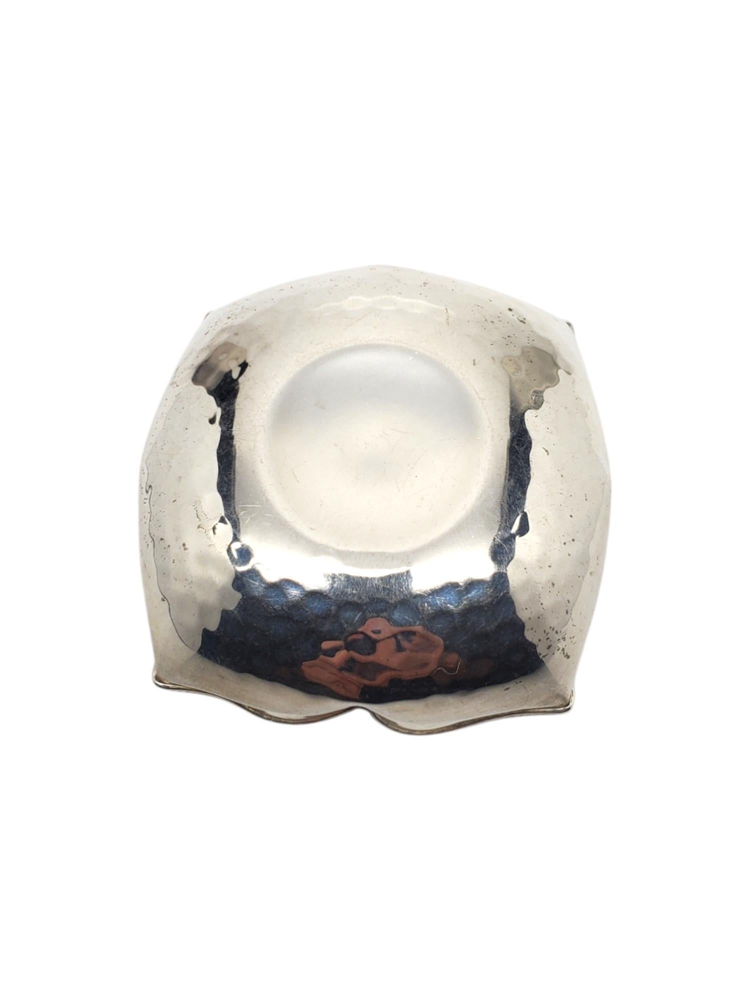 Greek Sterling Silver Hammered Pedal Dish With Mapia Engraving -

This unique Greek hammered pedal dish in sterling silver with Mapia engraved in center.

Size: 66.19 mm x 64.62 mm

Stamped: 925 GREEK MAKER

Weigh: 16.9 dwt / 26.3 gr.

Will come