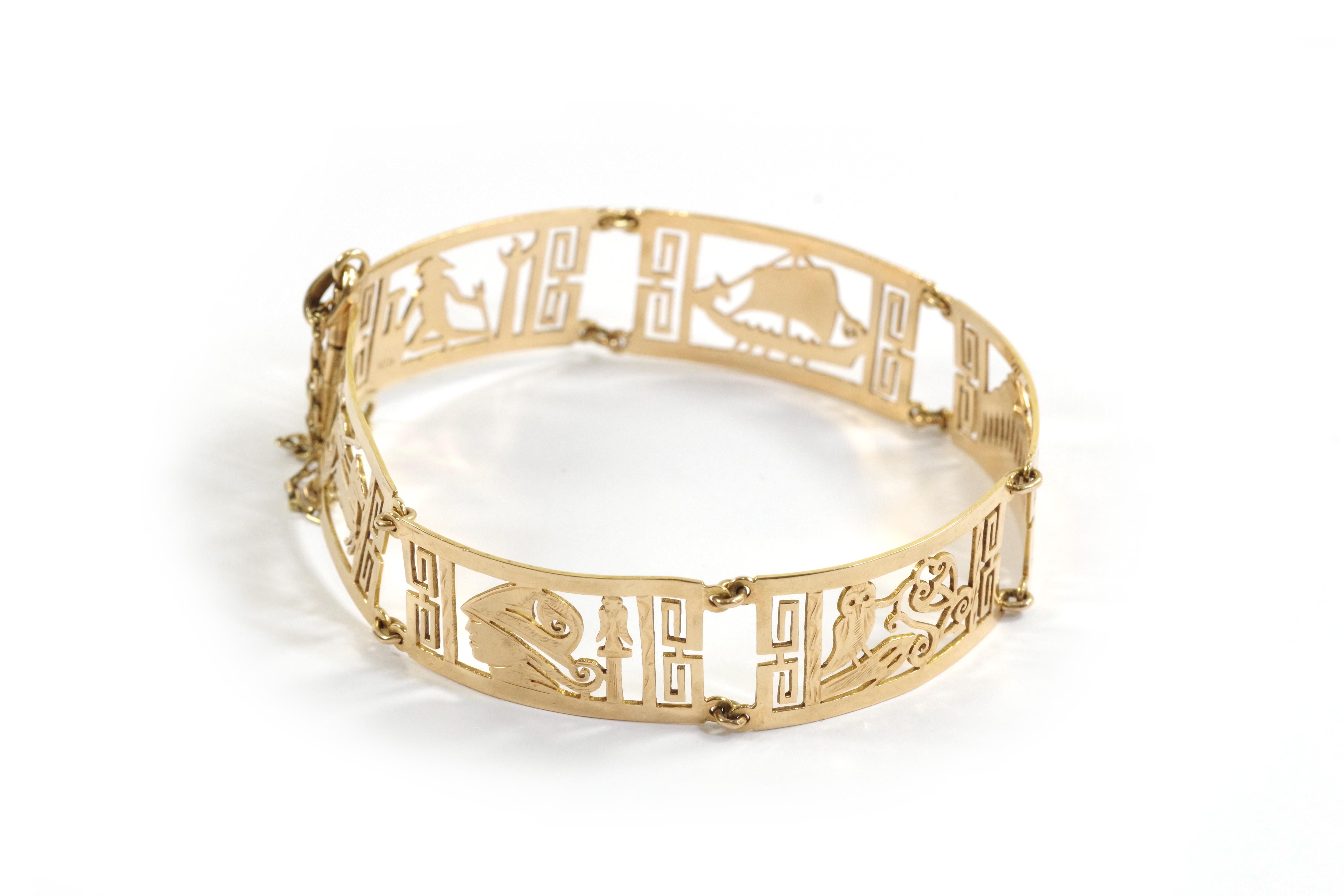 Greek style bracelet in 18 karat gold. Bracelet with large rigid links and openwork decorations evoking Greece. The rectangular links feature Athena, Hermes, the Parthenon, the Athens owl, a Roman trier (boat) and a horse-drawn chariot race. Vintage