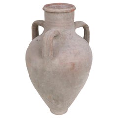 Vaso greco di terracotta a tre braccia con anfora