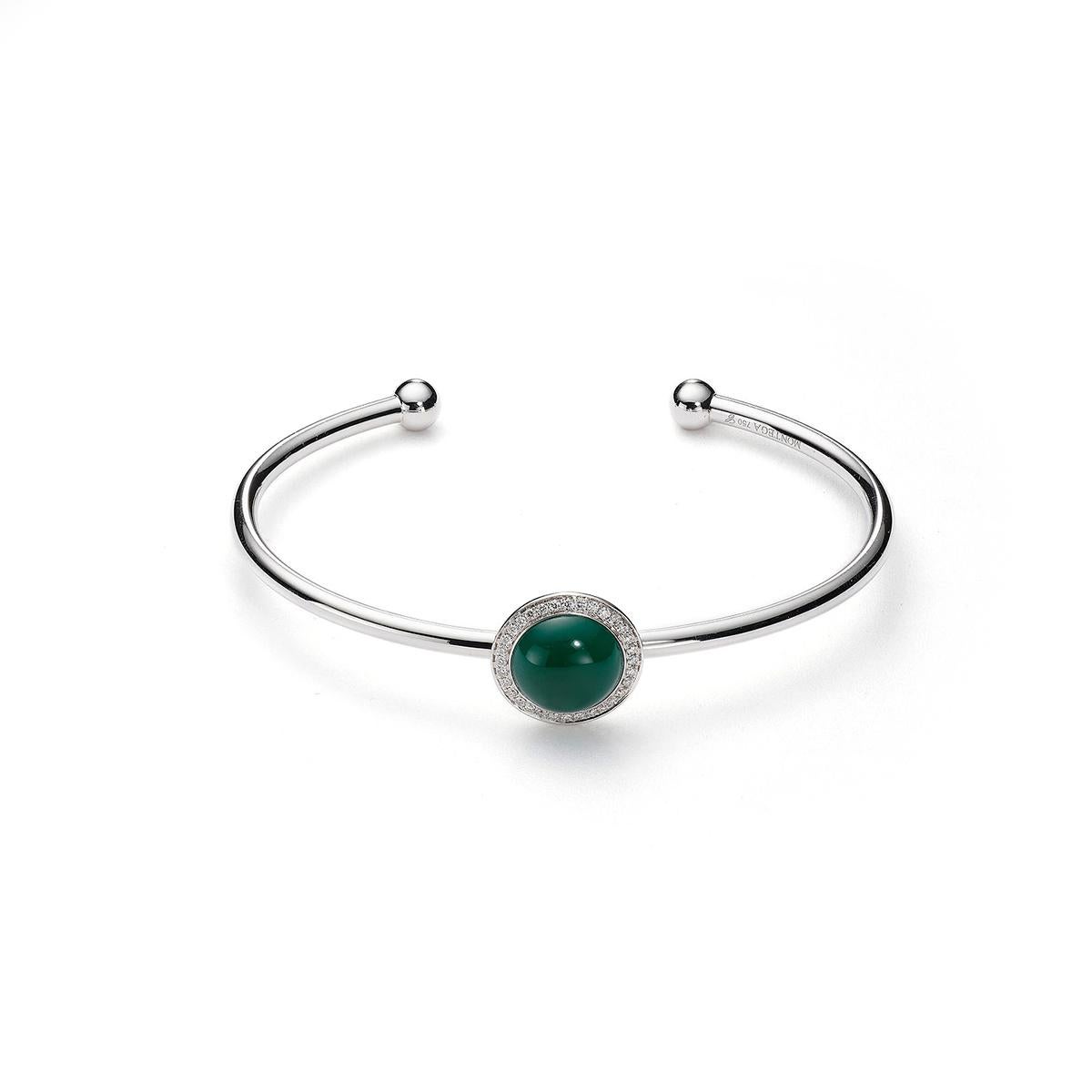 Bangle in 18kt white gold set with one green agate cabochon cut 2.78 cts and 32 diamonds 0.16 cts        