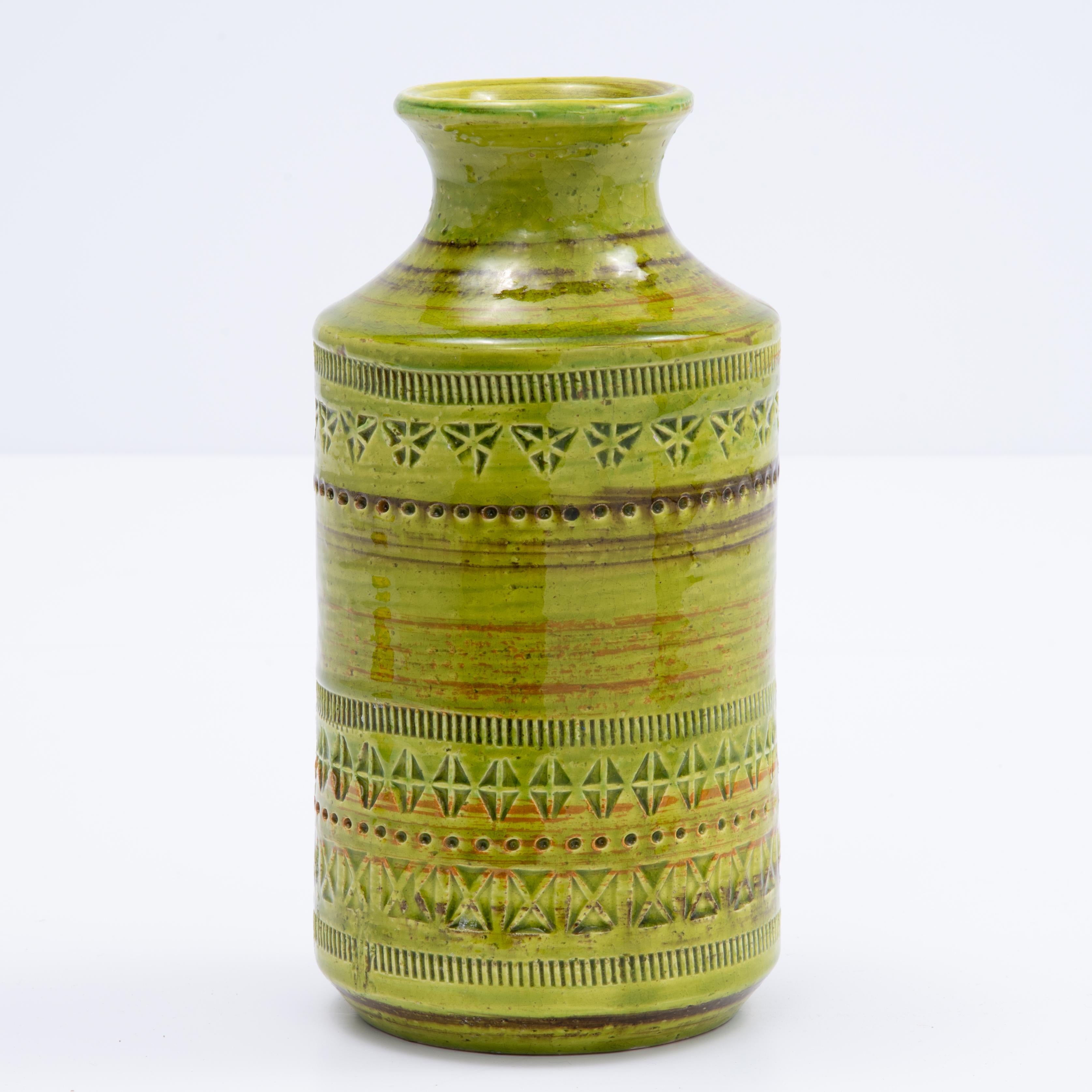 A fantastic  Aldo Londi Bitossi Italy vase imported by Rosenthal Netter. Rare green color. Hand impressed and hand painted glazed vessel in chartreuse, lime green, earthen brown and orange highlights. Original Rosenthal Netter sticker...