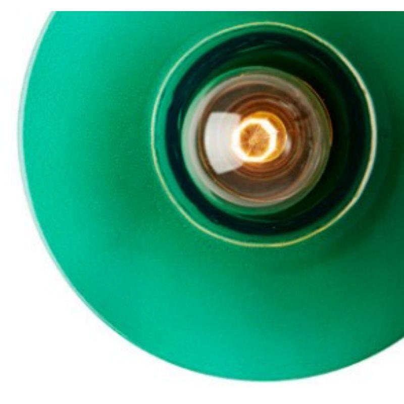 Green Alvéole wall light by RADAR
Materials: Translucent thermoformed glass, metal.
Dimensions: Depth 15 x Diameter 27 cm

Also available: In other colors. Base available in black metal or solid oak.

All our lamps can be wired according to