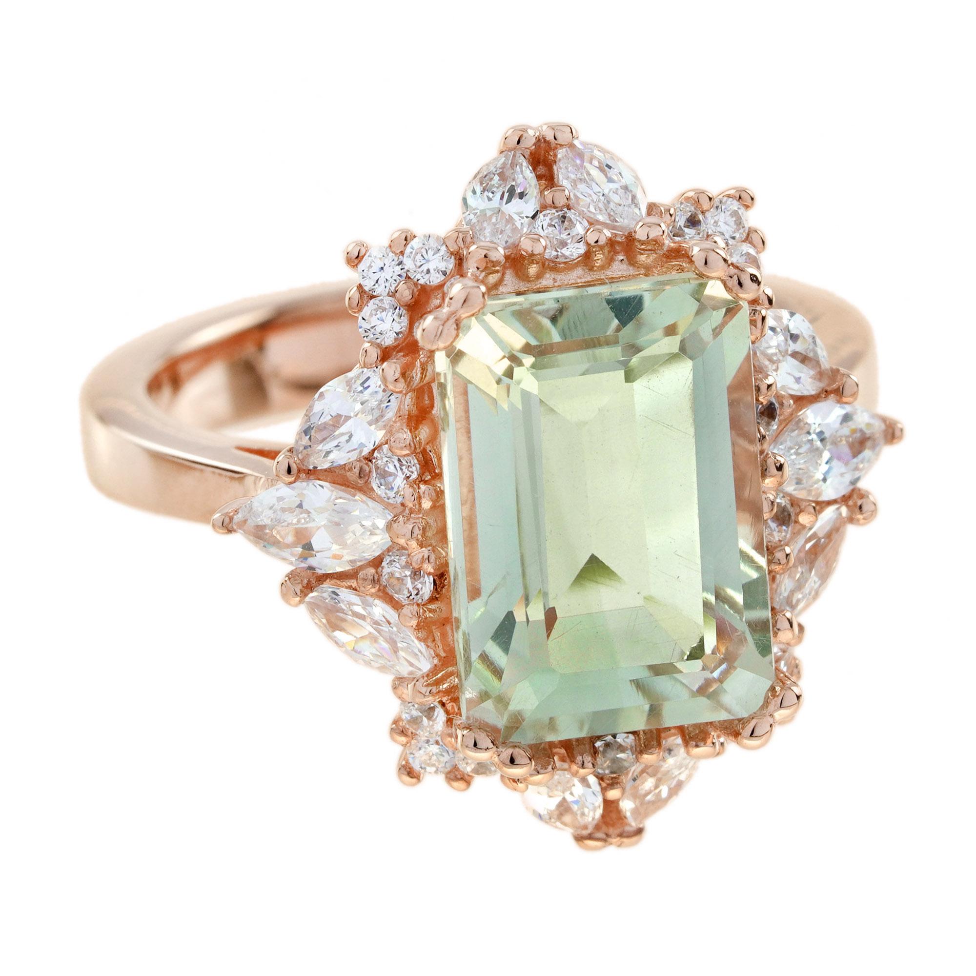 A stunning emerald-cut green amethyst at the center, exuding a soft, sophisticated glow. The amethyst is beautifully accented by sparkling diamonds, adding a touch of brilliance, all set in luxurious rose gold. The combination of the cool green