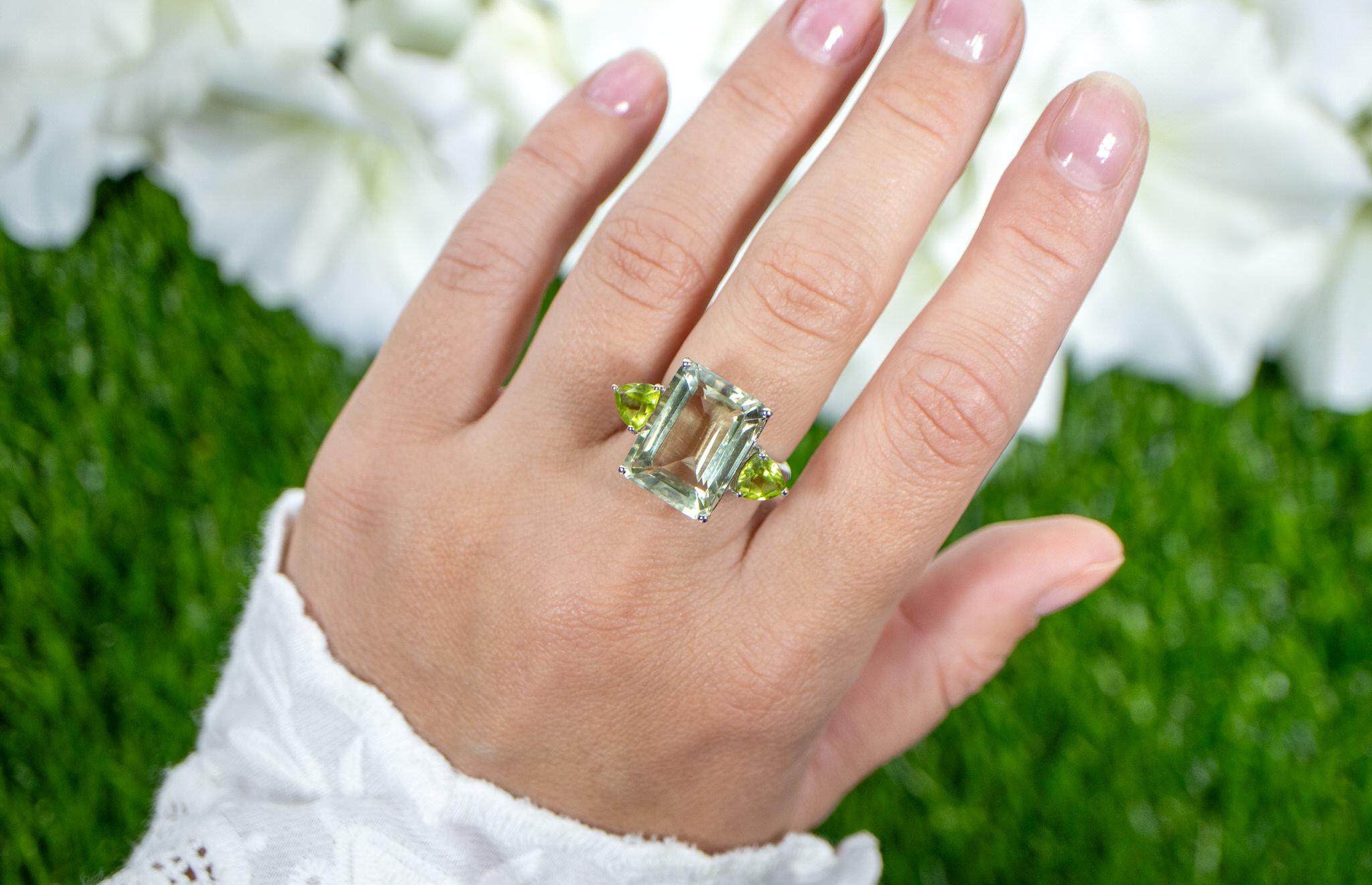 It comes with the Gemological Appraisal by GIA GG/AJP
All Gemstones are Natural
Green Amethyst = 10.50 Carats
2 Peridots = 1.50 Carats
Metal: Rhodium Plated Sterling Silver
Ring Size: 8* US
*It can be resized complimentary
