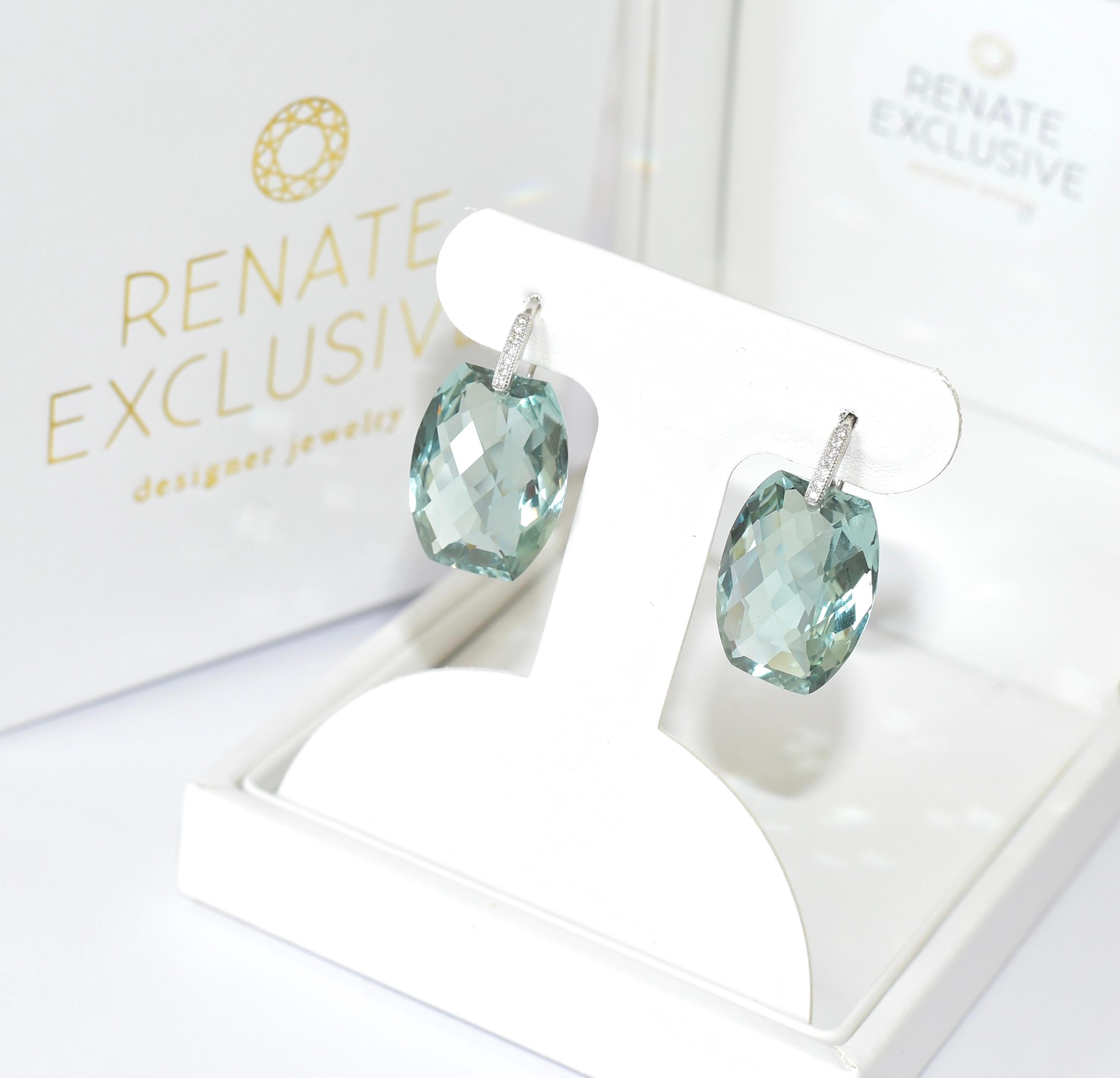 A gorgeous pair of lab-created Green Amethyst (23mm x 18mm) with Sterling Silver. Timeless jewelry design that takes your breath away! Ocean green/blue (Seafoam green) color with sparkling shine!
A bonus is an affordable price!
Simple. Lovely.