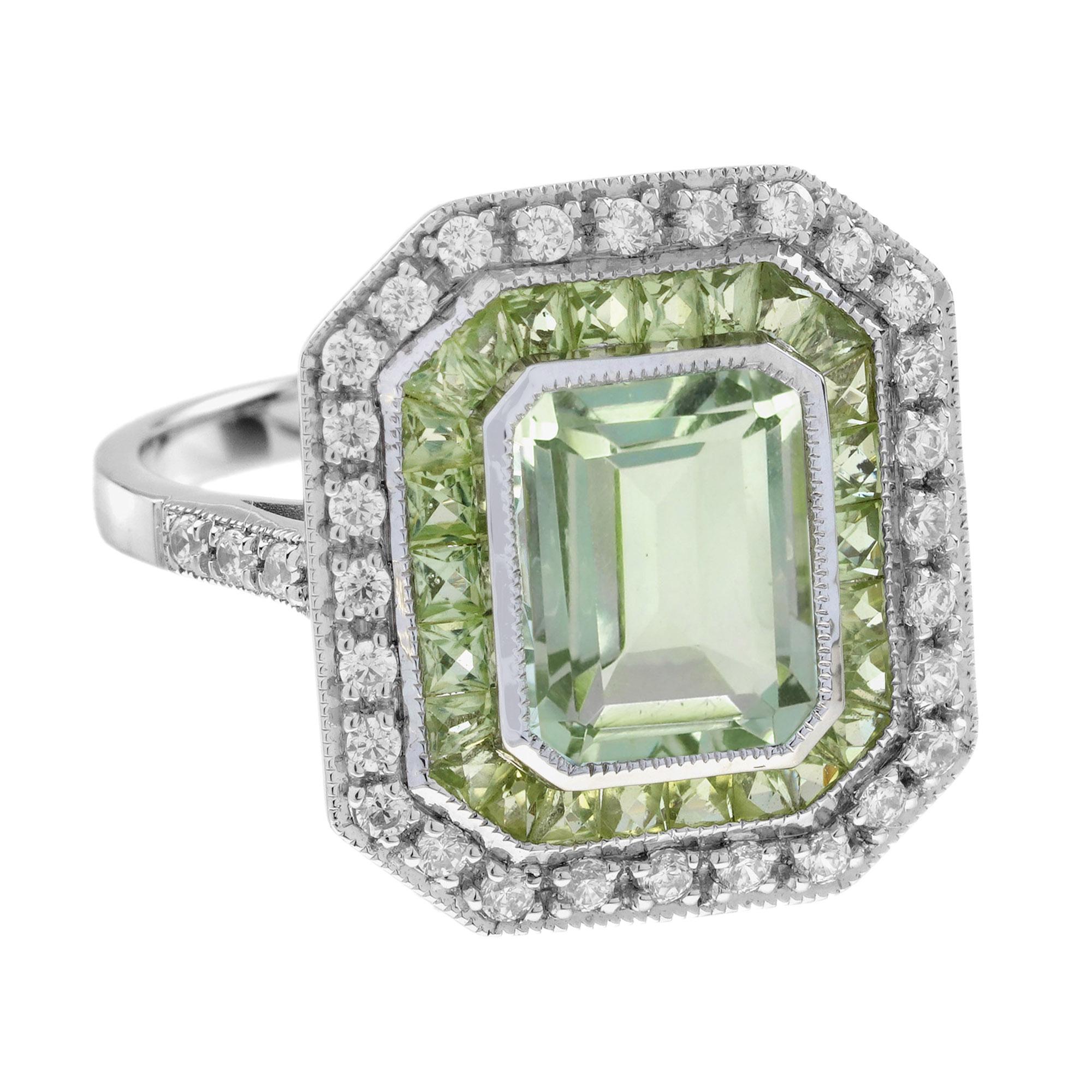 This Green Amethyst Peridot and Diamond Art Deco Style Engagement Ring combines elegance and vintage charm. The emerald-cut green amethyst at the center is surrounded by vibrant peridot accents, while a delicate diamond adds a touch of sparkle.