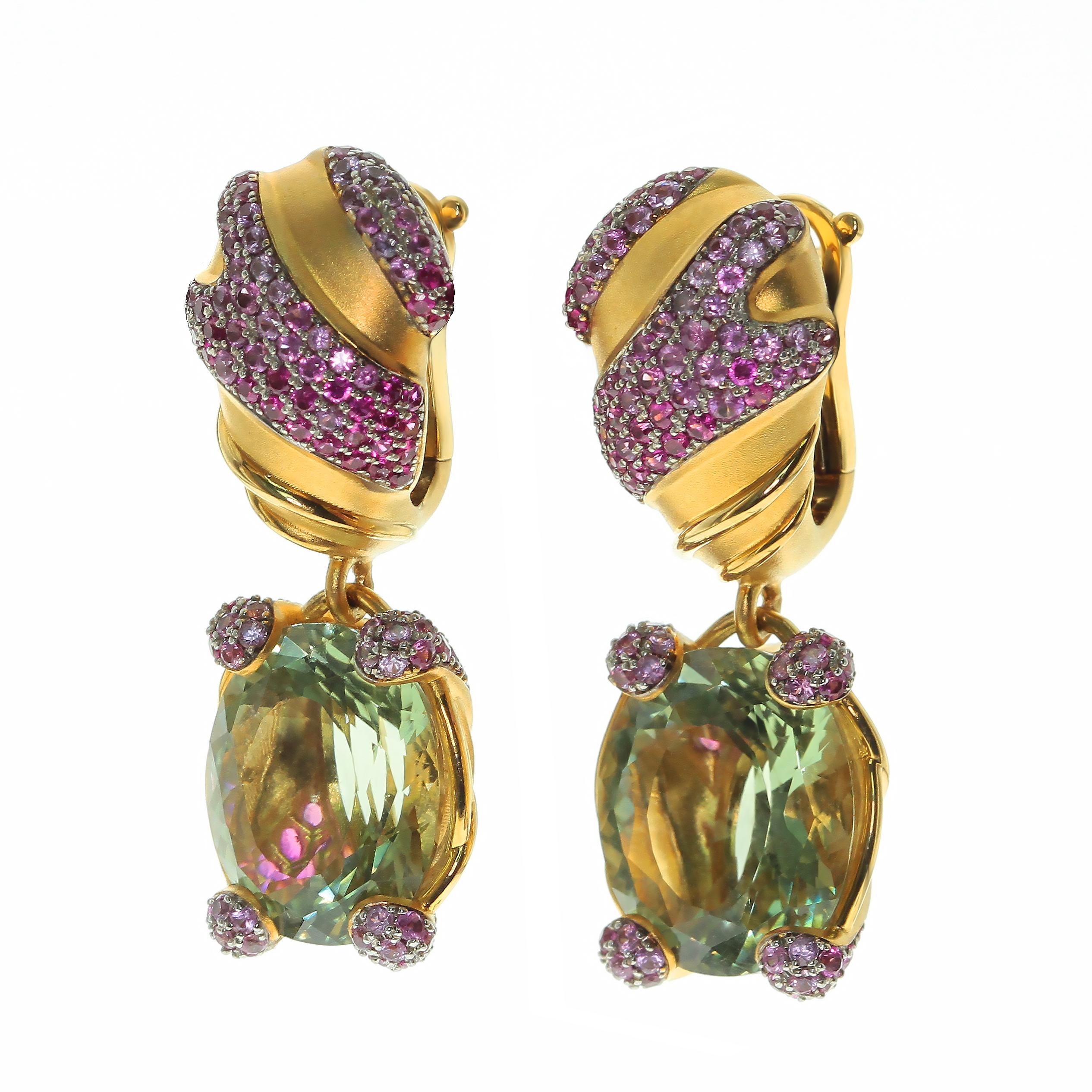Green Amethyst Pink Sapphire 18 Karat Yellow Gold Earrings
Green Amethysts weighing 8.76 carat are the center of the designer's artistic project. Yellow 18 Karat Matte Gold perfectly set off the shimmer of Pink Sapphires. Gold color remind us the