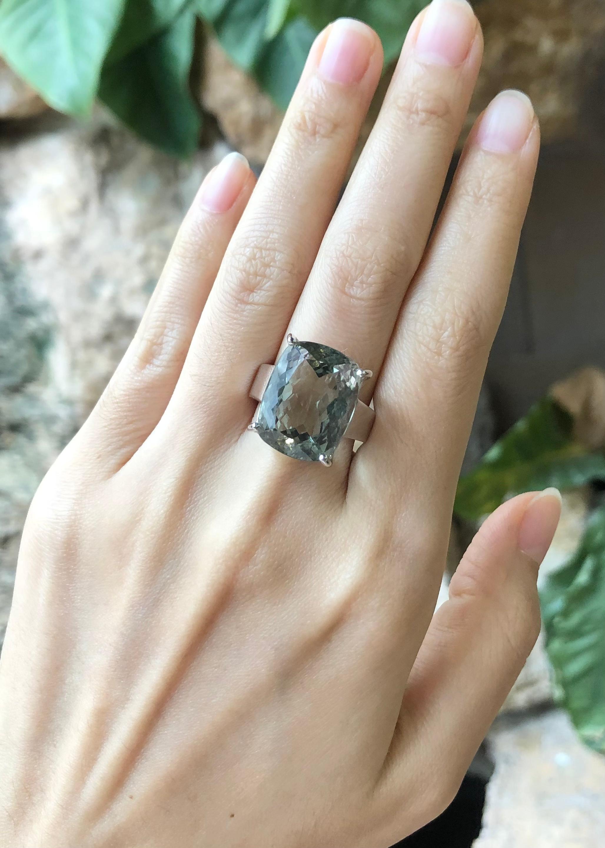 Green Amethyst Ring set in Silver Settings

Width:  1.4 cm 
Length: 1.8 cm
Ring Size: 56
Total Weight: 11.45 grams

*Please note that the silver setting is plated with rhodium to promote shine and help prevent oxidation.  However, with the nature of