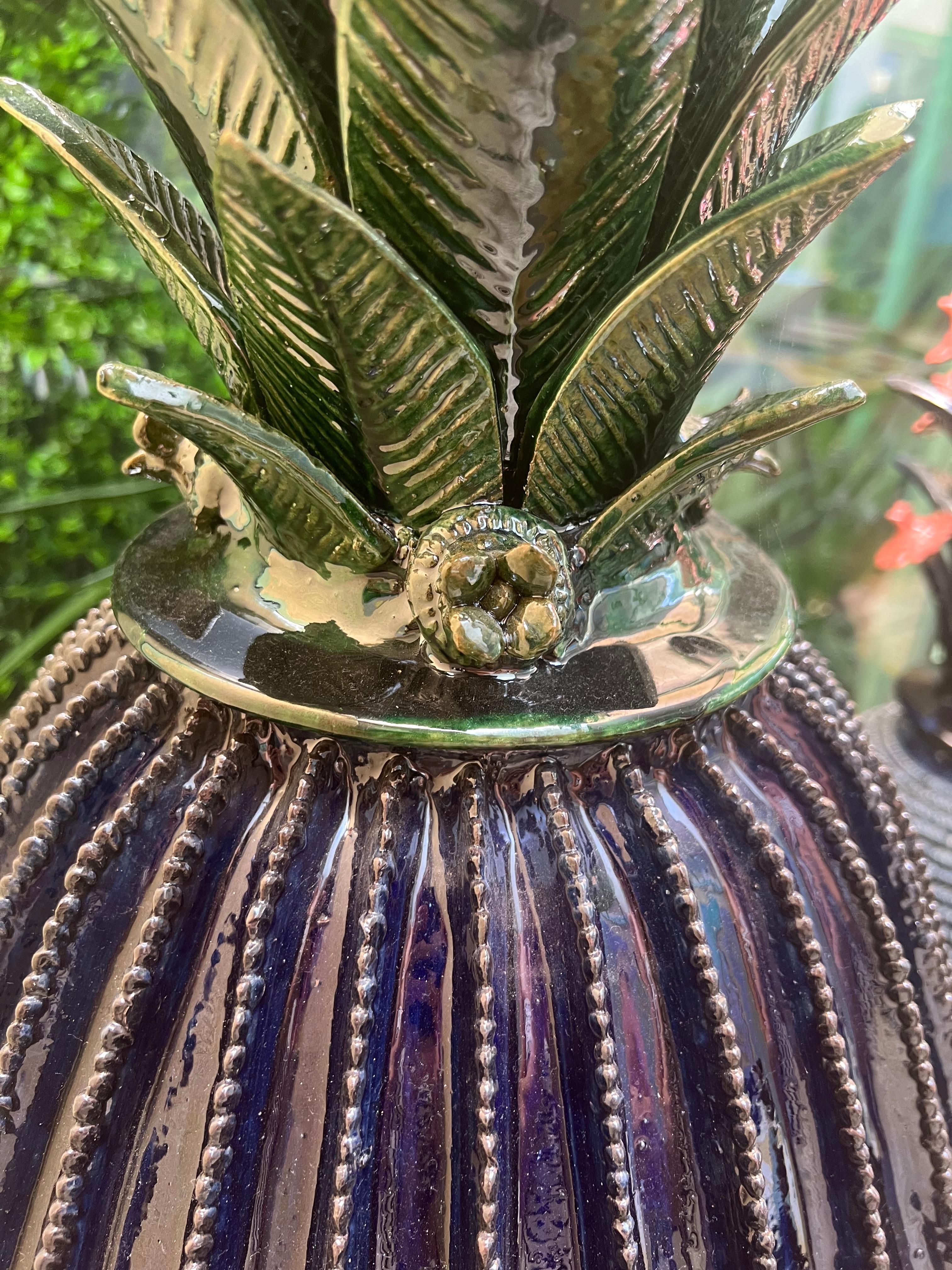 One of the largest of our pines is the Acanthus. The multiple layers of glazing achieve an unparalleled brilliance. Majestically shaped, this eye-catching blue and green cactus will grace your home or terrace. 

Benjamin and Miriam, founders of