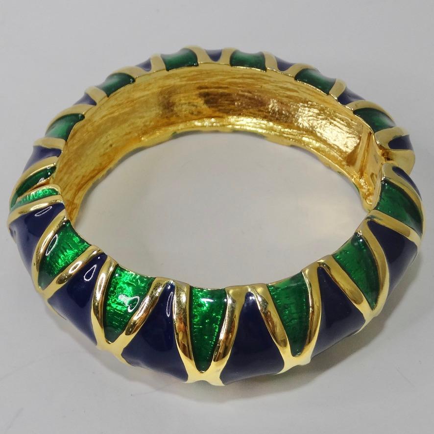 Stunning plated gold vintage cuff bracelet! Featuring the most stunning shades of emerald and navy triangle enamel contrasting gold outlines. This bangle is so stunning and will add the perfect pop of color to any look while still keeping it feeling