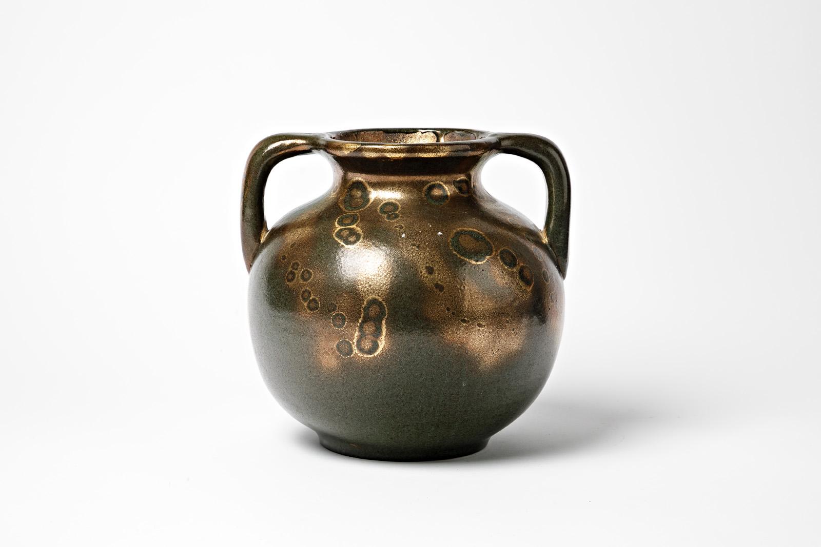 Attributed to Lucien Brisdoux

Large art deco 1930 ceramic vase

Green and gold ceramic glazes colors

Original perfect condition

height 21 cm
Large 21 cm.
 