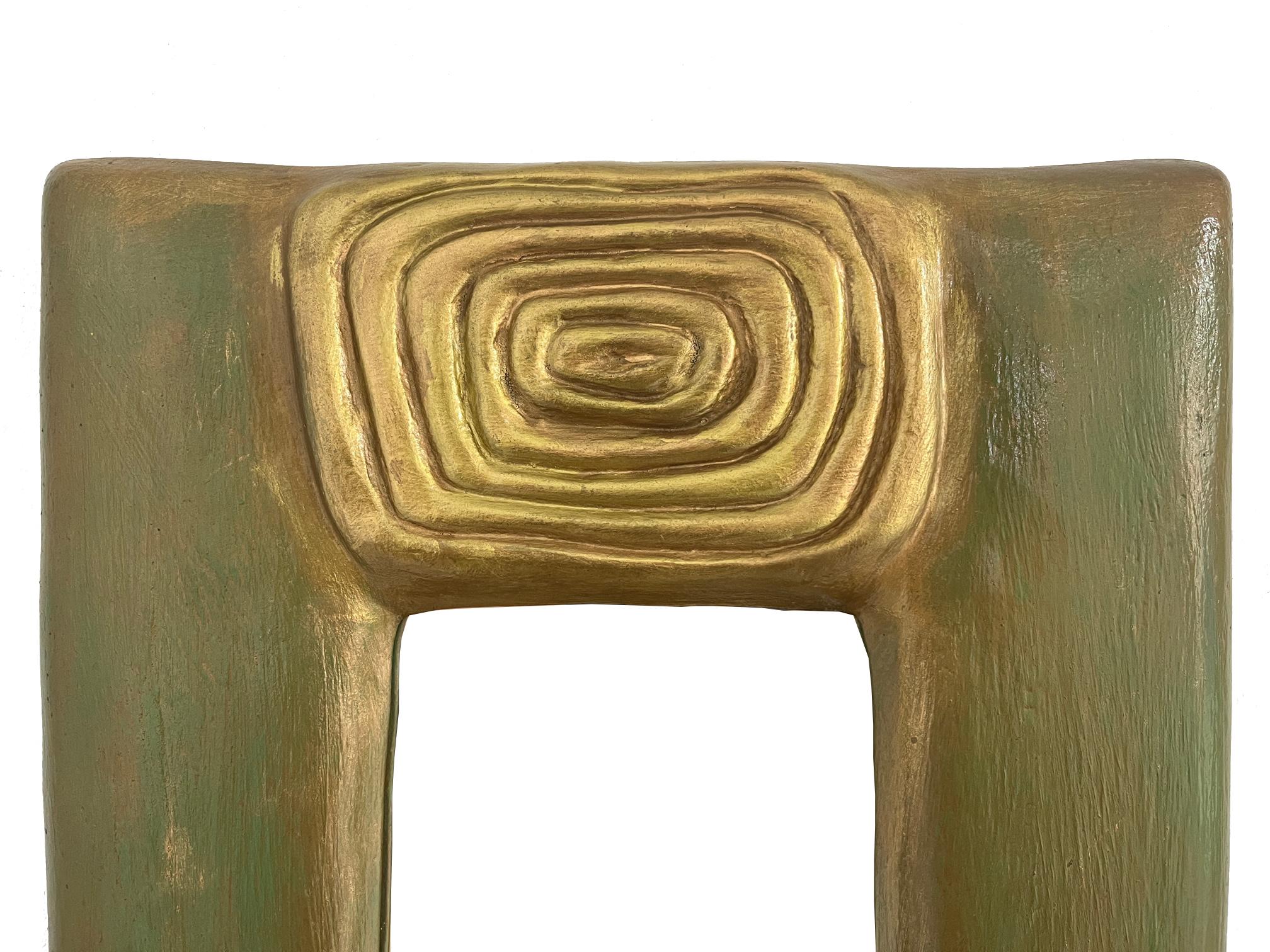 French Green and Gold Ceramic Mirror by Alice Colonieu, Mid-20th Century

The mirrored part is not original and not signed but you can see on the last picture of Alice colonieu with the mirror in her hands.

Alice Colonieu was a French ceramist,