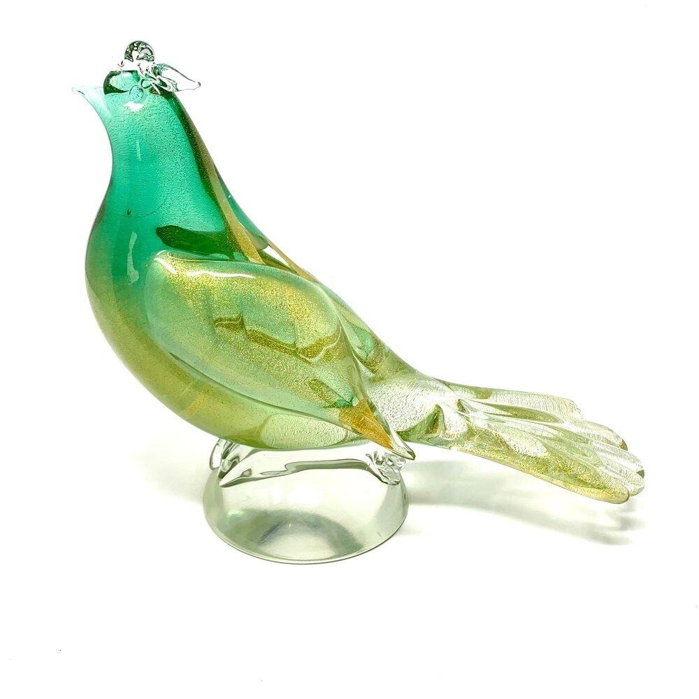 Vintage green and gold Italian Murano art glass bird. In excellent condition.

Width: 9 in / Depth: 4 in / Height: 8 in