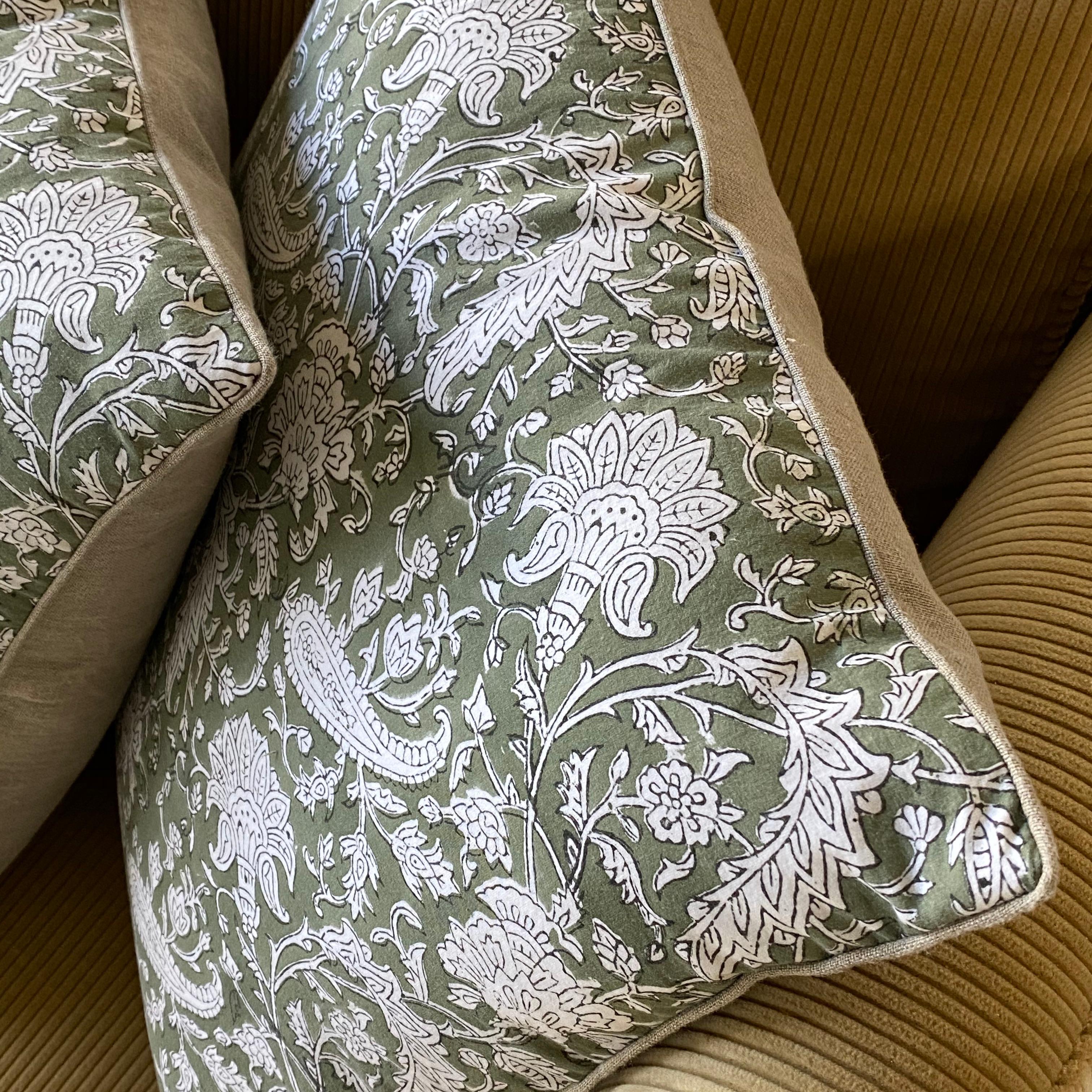 Green and natural Paisley block print pillow with linen piping. Feather and down insert included.