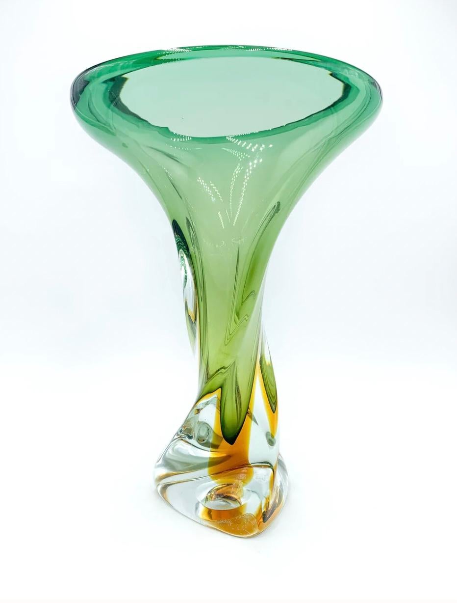 Beautiful vase in green and orange Murano glass, made with the submerged glass technique in the 60s

Measures: Ø cm 23 H cm 34

Flavio Poli was born in 1900 in Chioggia and is known for being a great Italian ceramist, draftsman and painter. Poli