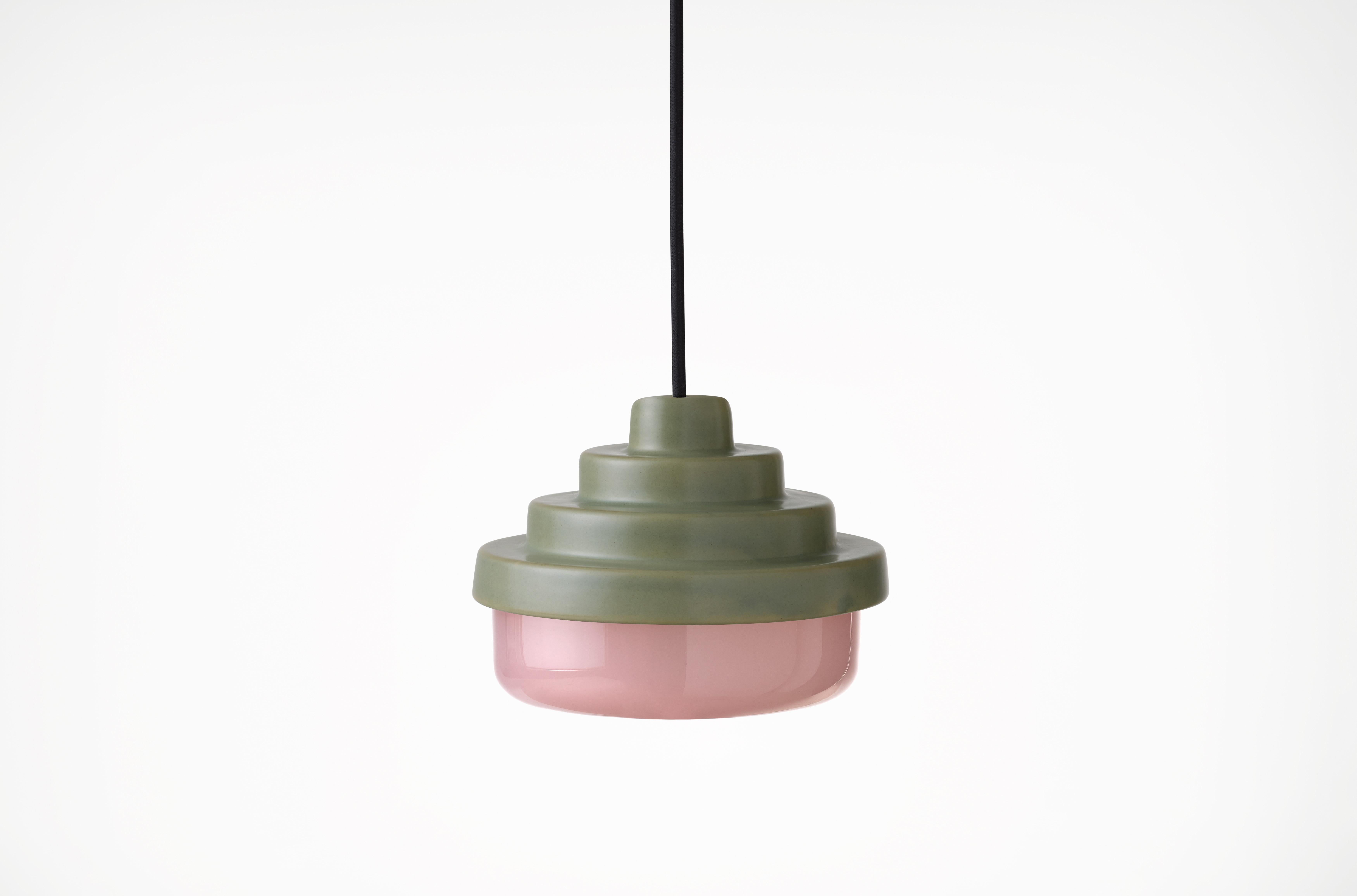 Green and Pink Honey Pendant Light by Coco Flip
Dimensions: D 18 x W 18 x H 13 cm
Materials: Slip cast ceramic stoneware with blown glass. 
Weight: Approx. 2kg
Glass finishes: Pink.
Ceramic finishes: Green satin glaze. 

Standard fixtures included
1