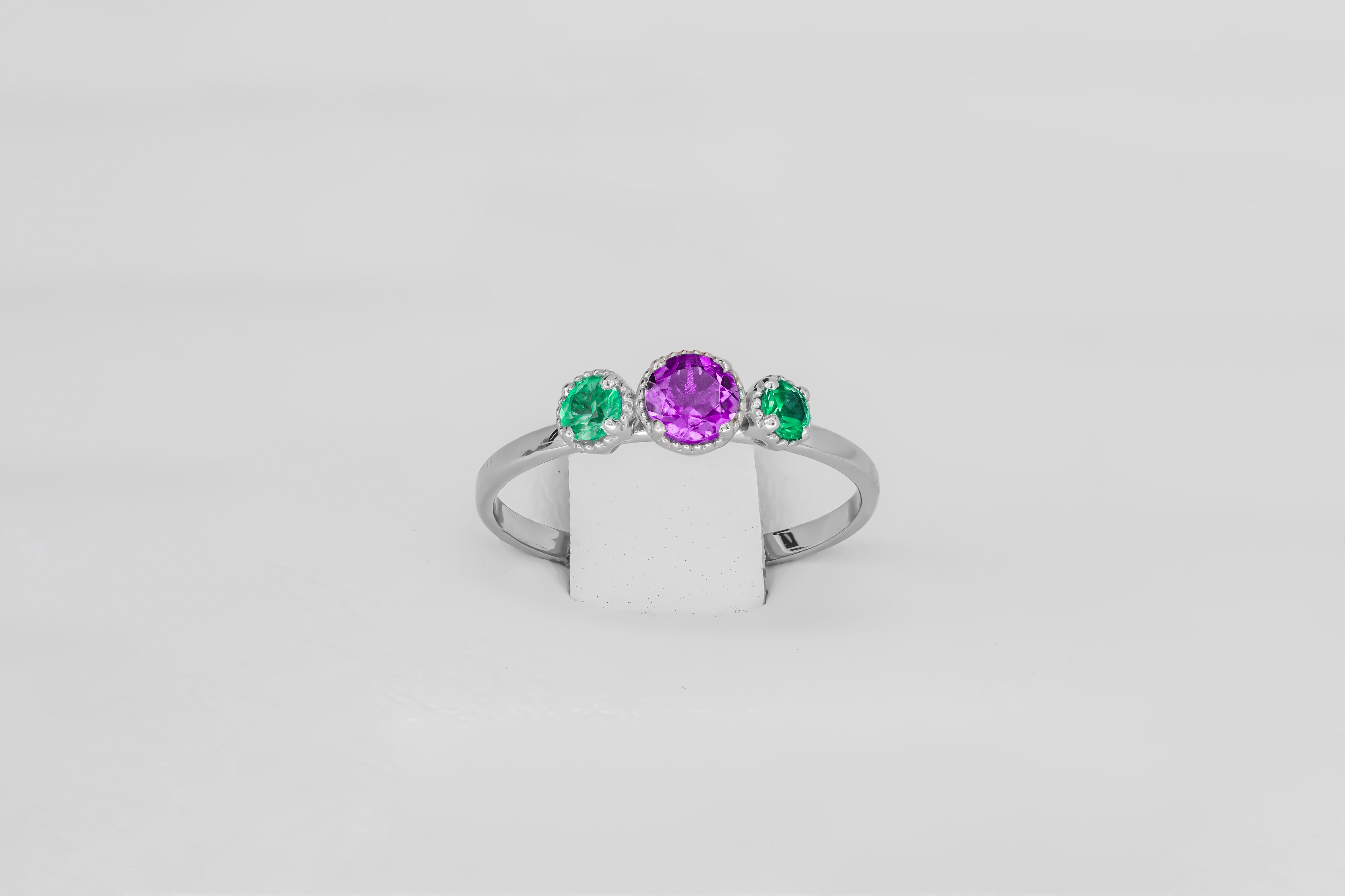 For Sale:  Green and purple gem 14k gold ring. 5