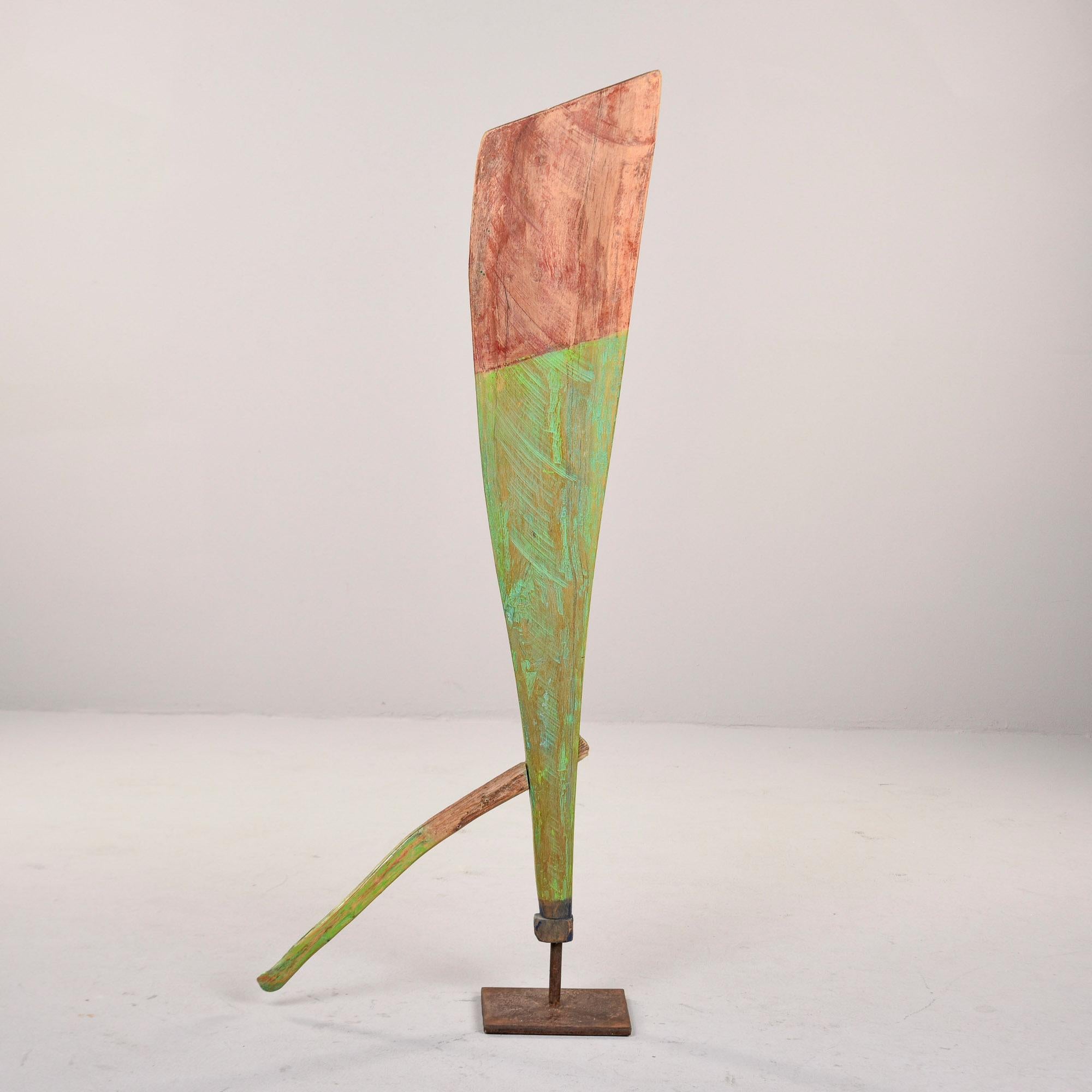 Found in England, this circa 1900 wooden boat rudder is mounted on an iron display stand. Rudder found painted as shown - we do not know if the paint is original. Very good overall antique condition with surface wear and patina to painted surface
