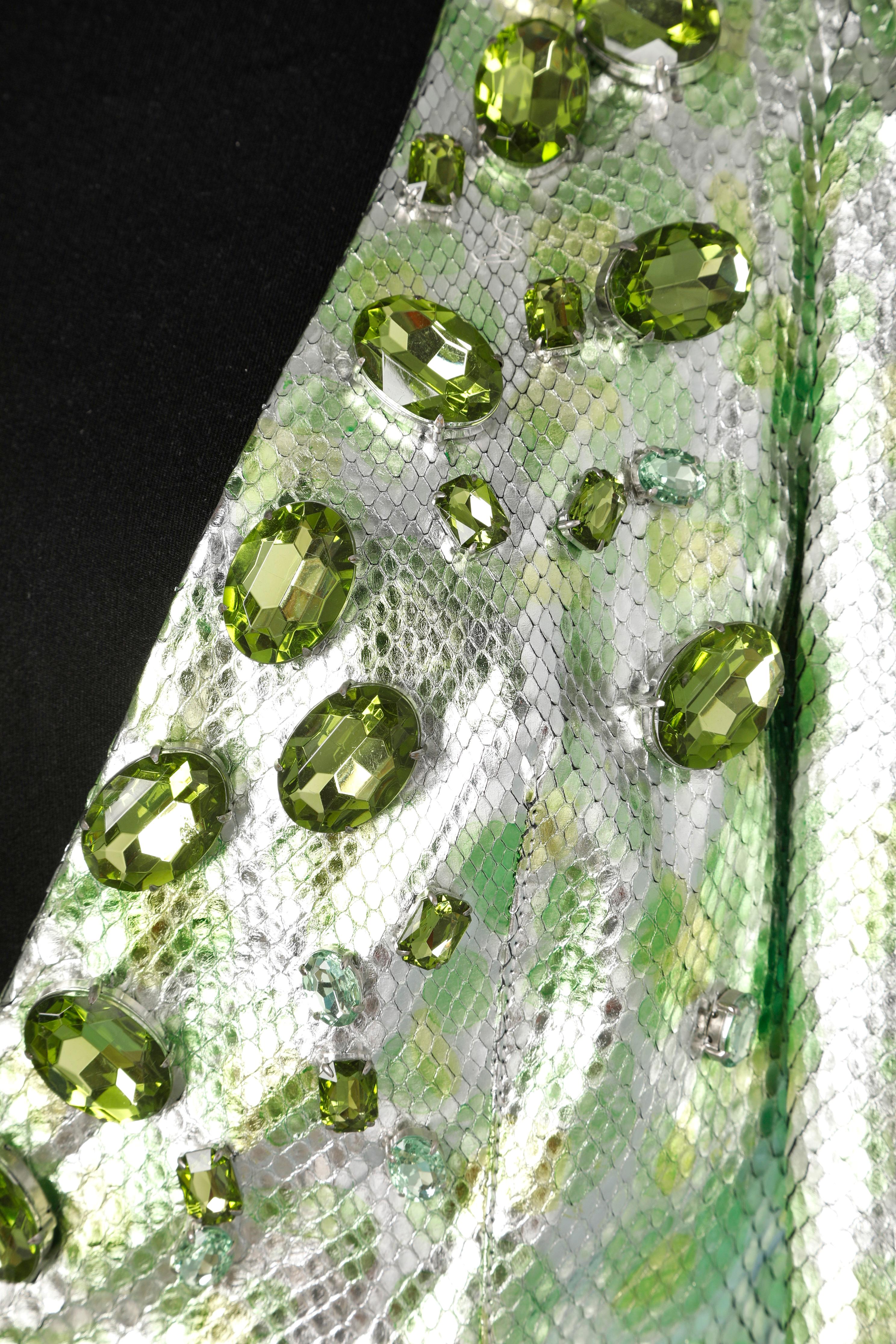 Silver python jacket with green spots and rhinestones 
back width 36cm
Size 36 French 
