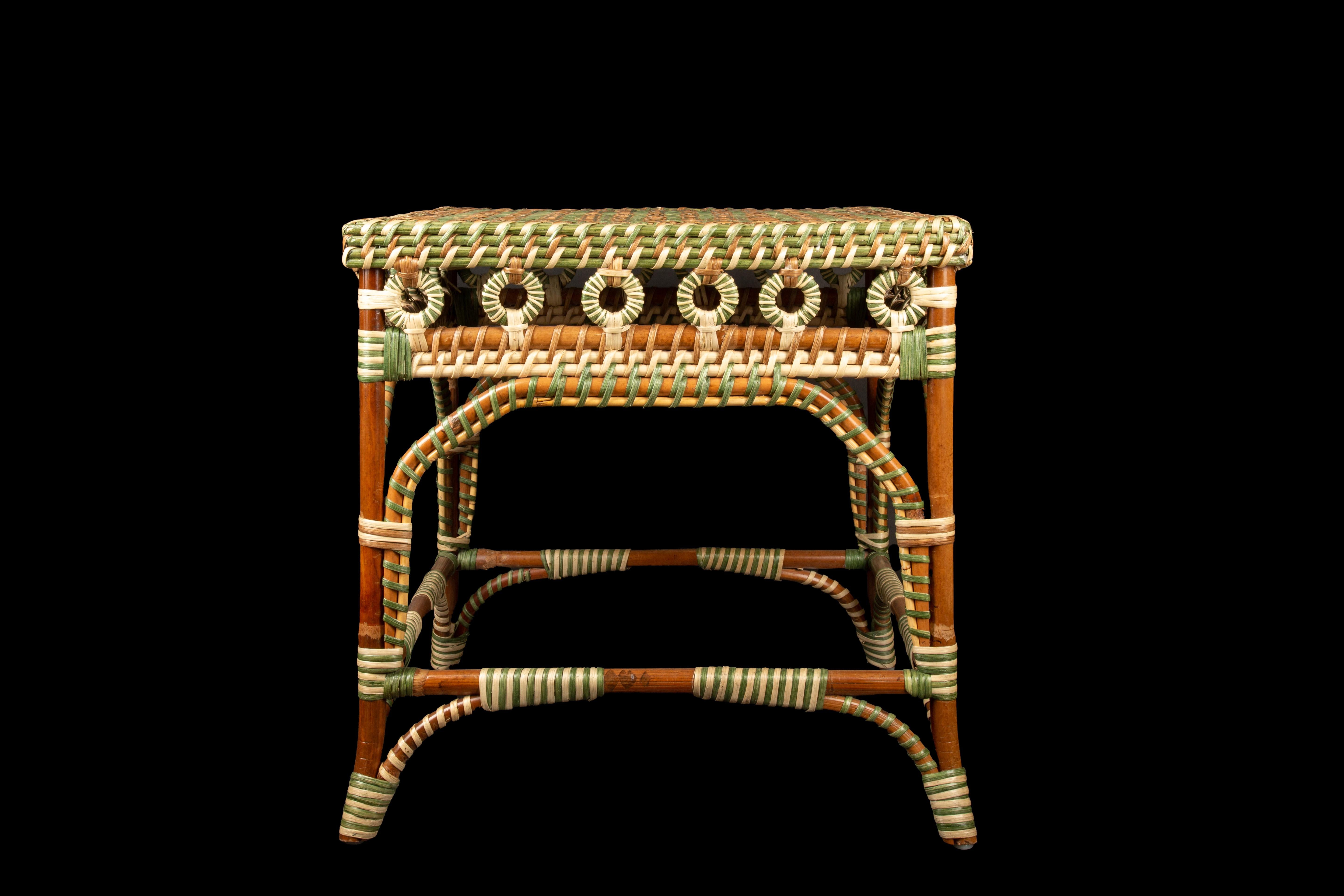 Green and Tan Rattan Square Side Table.

Introducing Creel and Gow's exclusive wicker and rattan collection, designed by Marco Scarani. We're proud to offer our customers these revised vintage rattan furniture pieces that have been skillfully