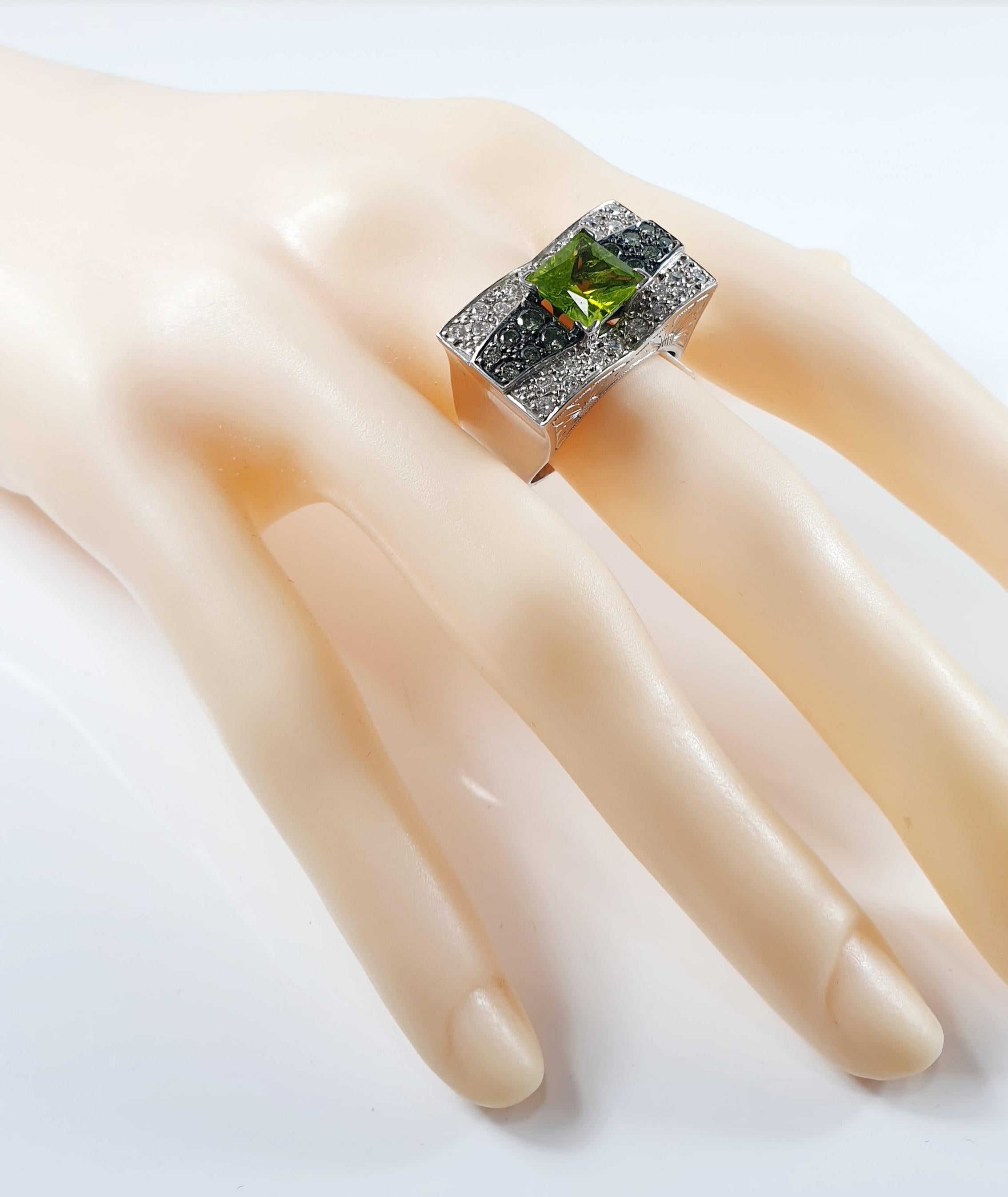 Women's Green and White Diamonds Wiht Tsavorite Center Stone in 18 Karat White Gold Ring For Sale