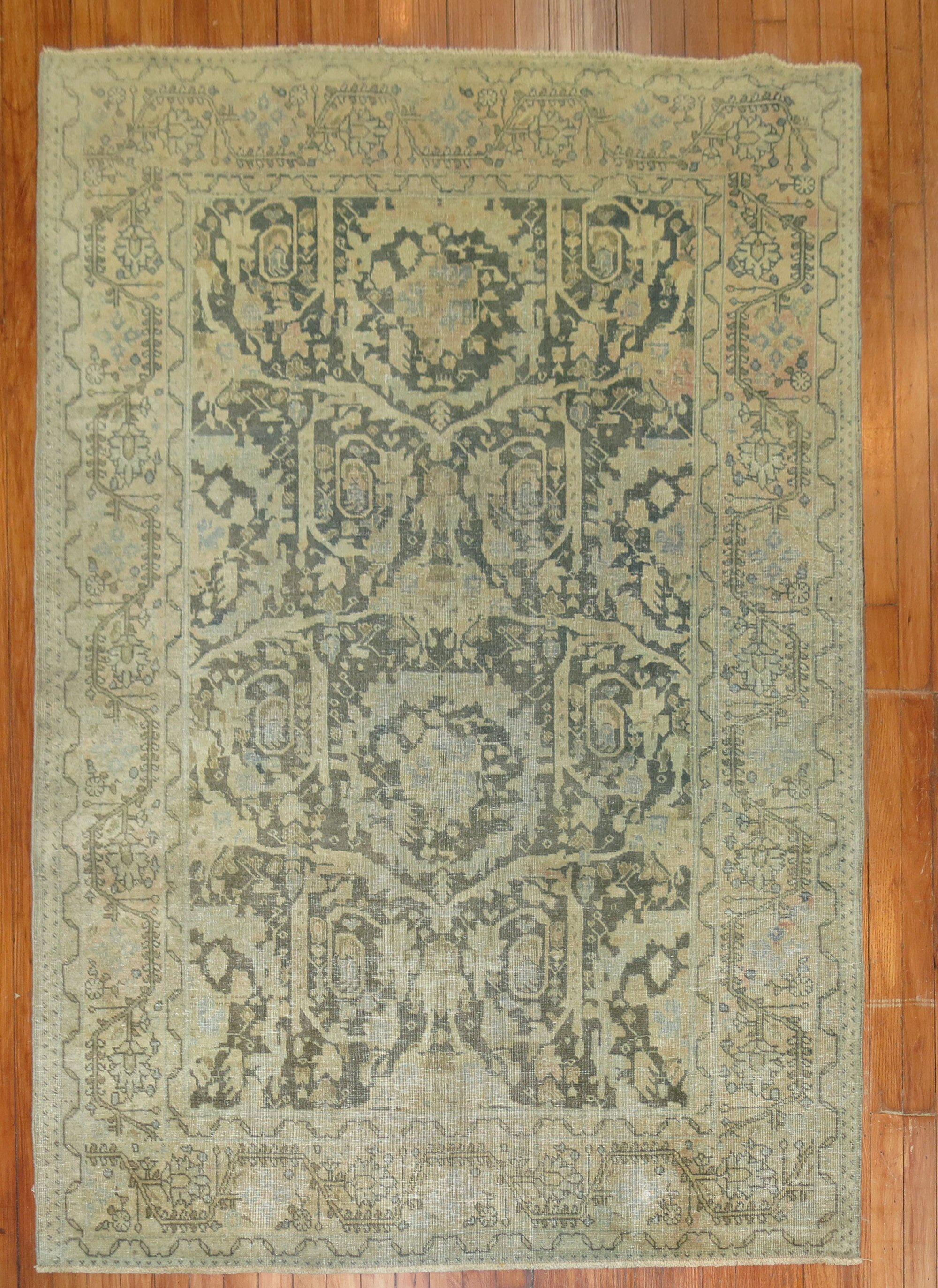 Early 20th century Persian Tabriz rug predominantly in green

Measures: 4'7'' x 6'1''.