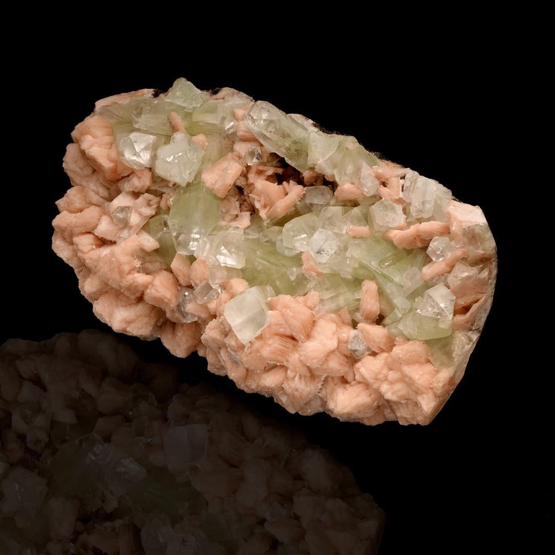 This large cabinet size combination specimen features lustrous, beautifully formed, large crystals of green apophyllite with lovely color and incredible, gemmy translucency growing on dense, abundant, large crystals of lush peach-hued stilbite for a