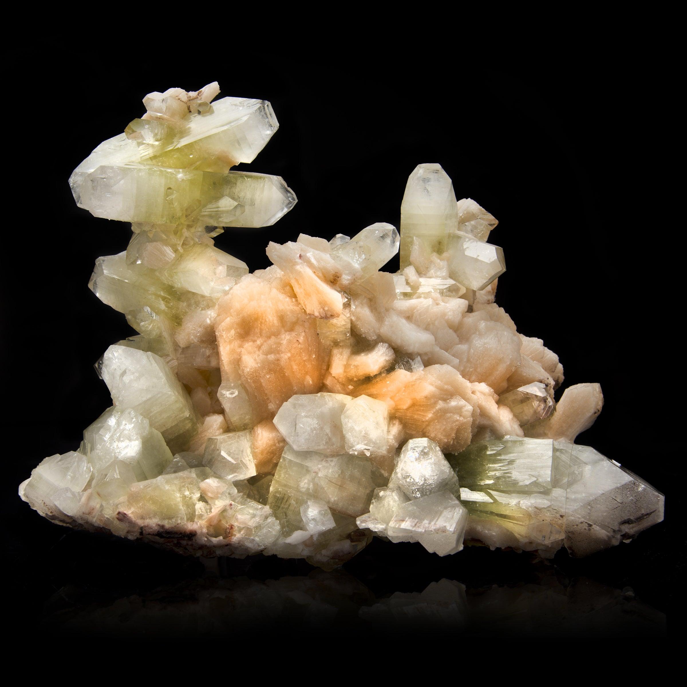 Punna, India

Stunning double-terminated Green Apophyllite crystals combined throughout with a wet luster peach Stilbite. All fully terminated and damage free, this remarkable Indian specimen is perfectly suited for collectors, or anyone looking for