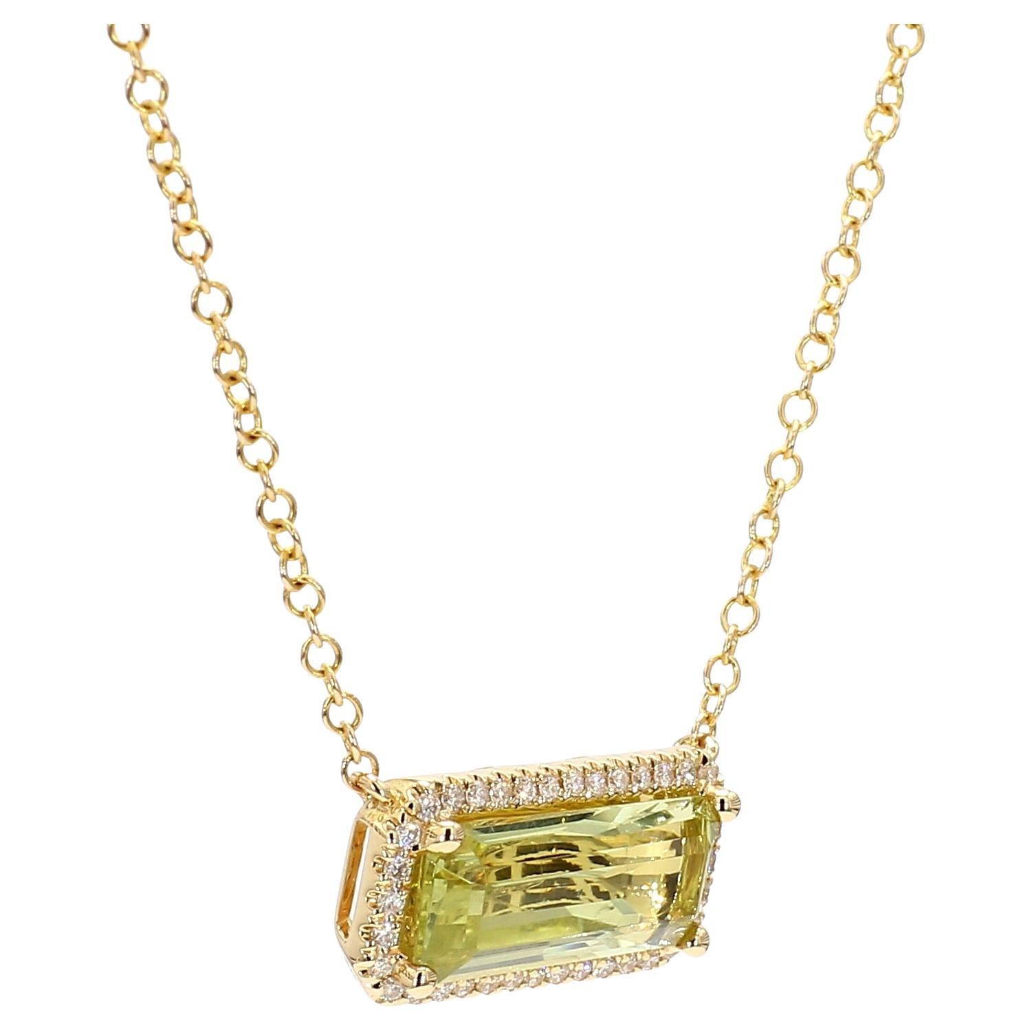 This Natural *Greenish Yellow* Beryl aka Aquamarine elongated *Emerald Cut*  Gemstone accented by a halo of white round diamonds is a testament to fine craftsmanship and timeless design. Perfect for those who appreciate the beauty of natural