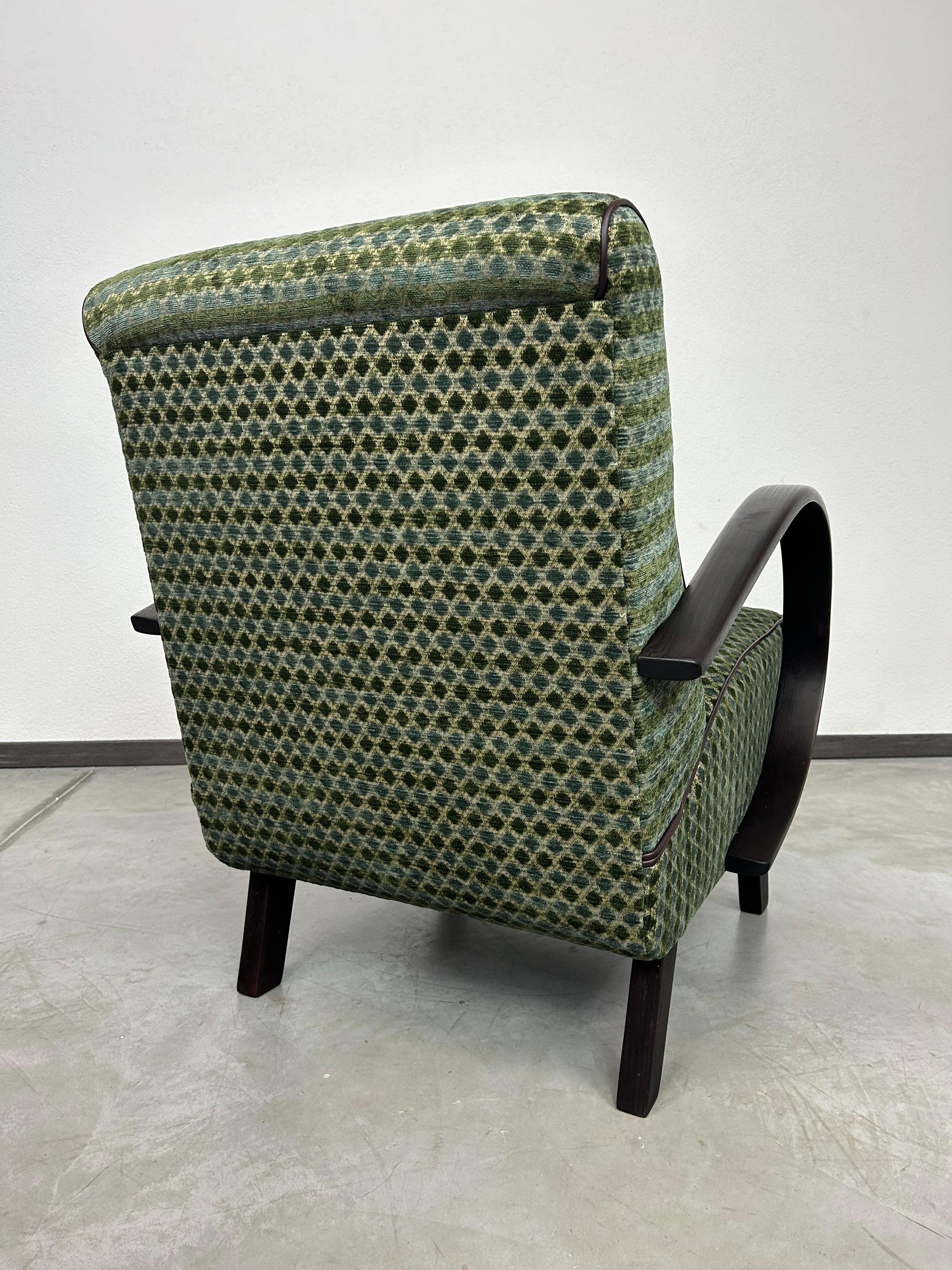Green art deco armchair by Jindřich Halabala 1