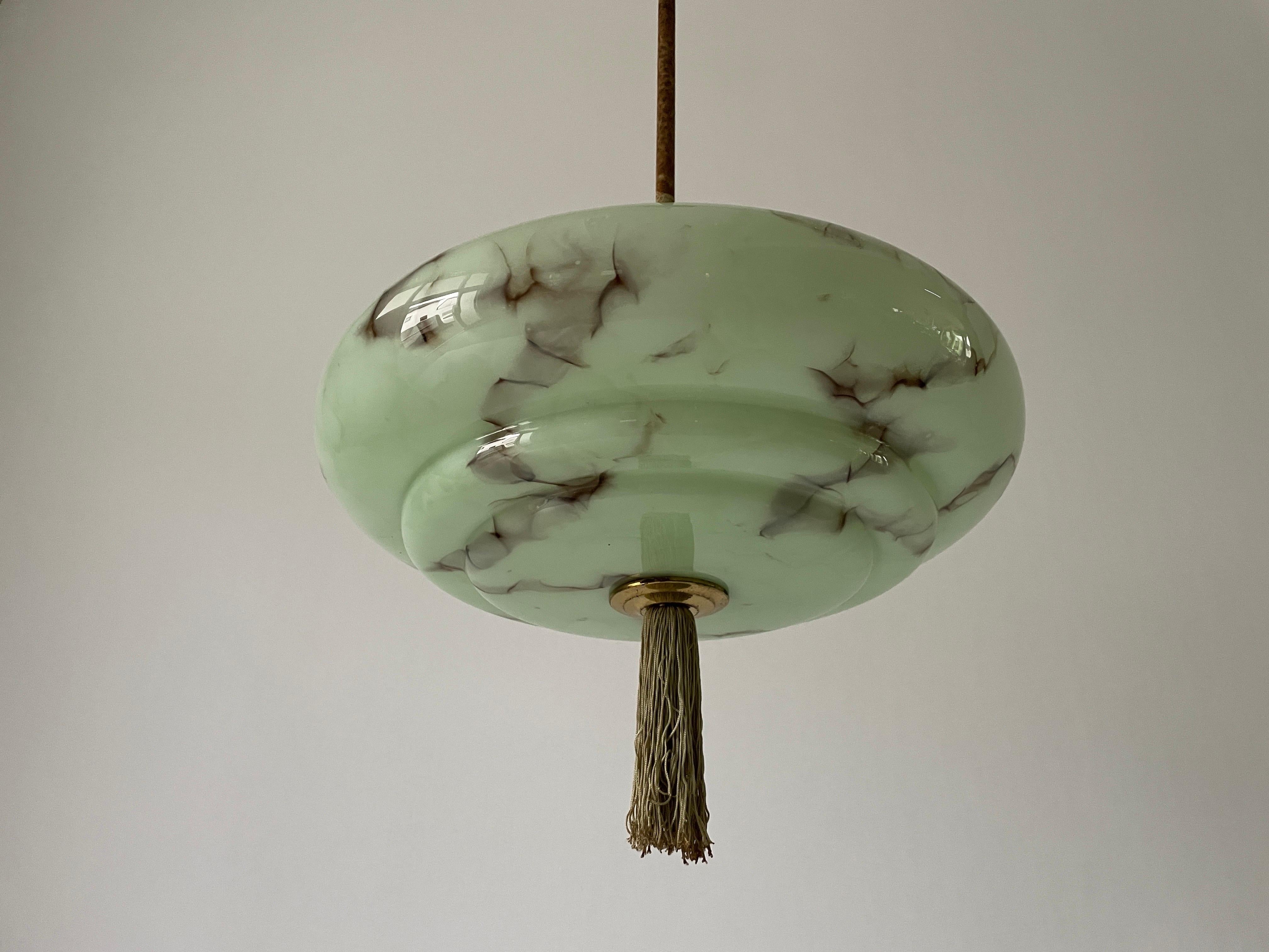 Green Art Deco Style Glass Ceiling Lamp, 1950s, Germany

Lampshade is in very good vintage condition.

This lamp works with E27 light bulbs. 
Wired and suitable to use with 220V and 110V for all countries.

Measurements: 
Height: 66 cm
Glass shade