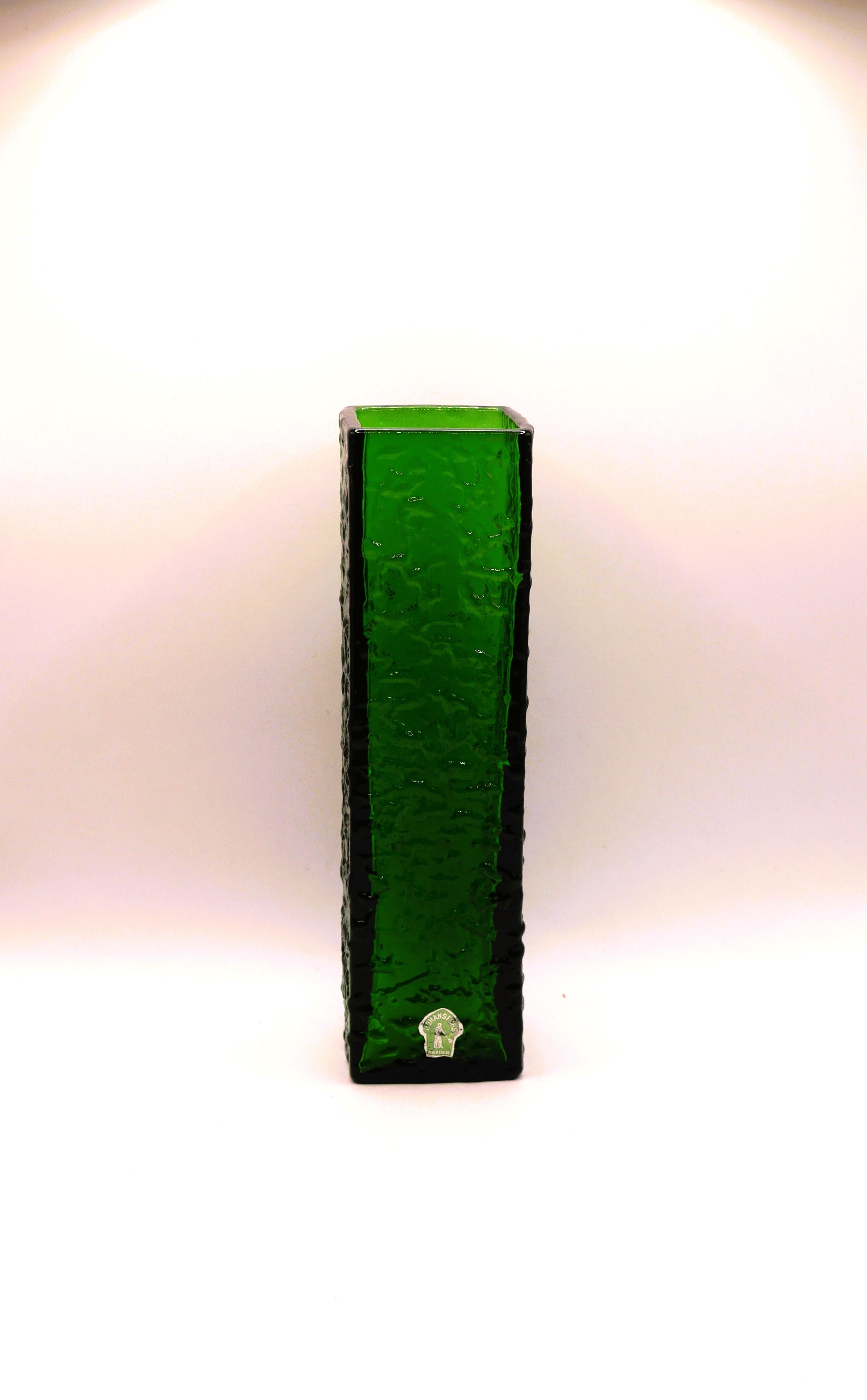 A nice vintage art vase, handmade by the talented designer Bengt Orup for Johansfors glasbruk, Sweden. The colour is vibrant emerald green and it has a nice texture, made in the 1960's and it is in a very good condition.

Johansfors Glasbruk
In