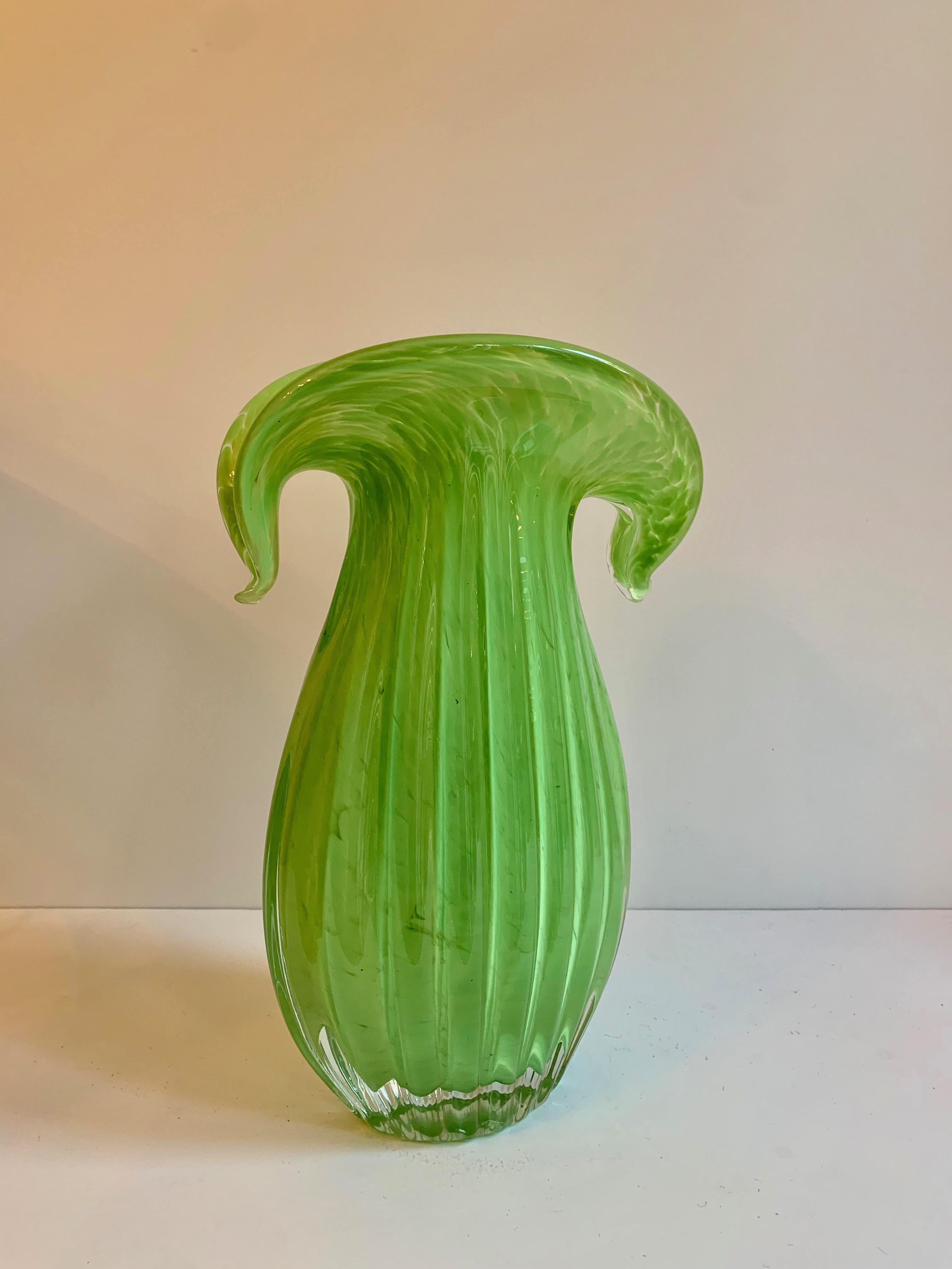 Green art glass vase, wonderful in size and shape with beautiful structural elements showing the artistry in the making of the piece, a wonderful practical piece or standalone sculpture.