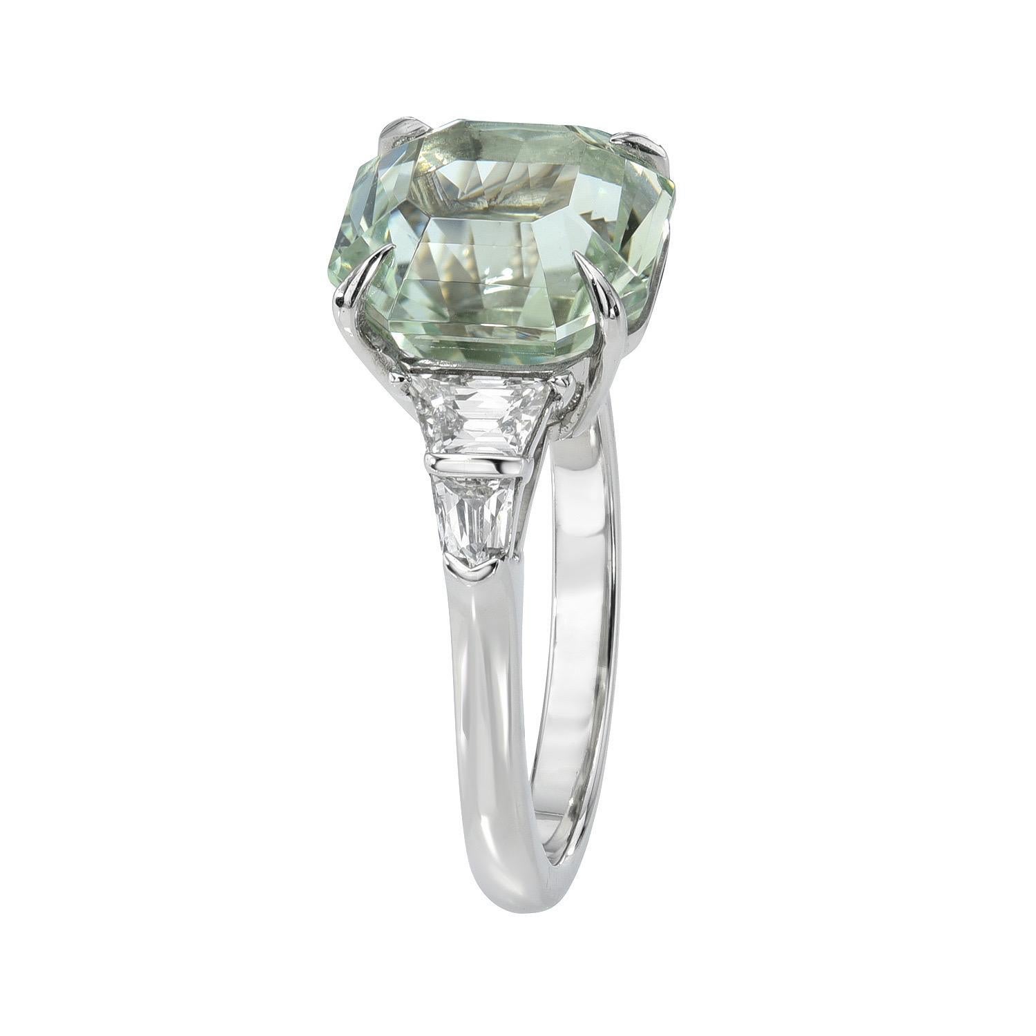Marvelous 4.96 carat Natural Green Beryl square radiant platinum ring, decorated with a total of 0.55 carat French cut Trapezoid and French cut Bullet diamonds, E/VS.
Ring size 6. Resizing is complementary upon request.
Returns are accepted and paid