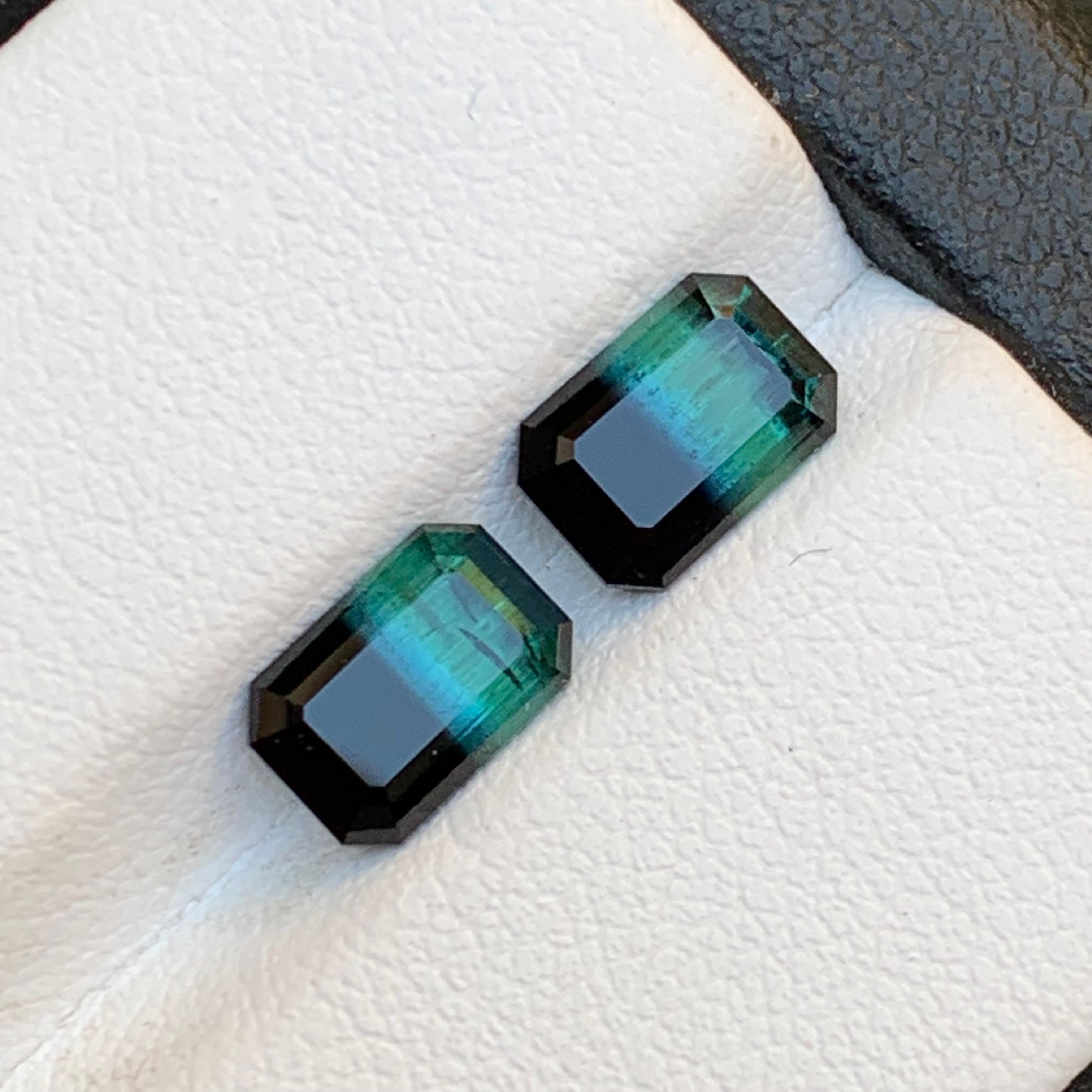 Bluish Green and Black Bicolor Natural Tourmaline Loose Gemstones Perfect Pair Set for Rings, Earrings, Necklace Pendant in  Emerald Cut from Afghanistan!!

💎 GEMSTONE TYPE: Tourmaline
⚖️ WEIGHT: 3.10 Carat
🪚 SHAPE & CUT: Emerald Cut
📏 SIZE (MM):