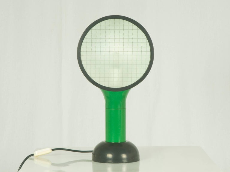 This table lamp was designed in Italy by Adam Thiani and Alberto dal Lago in 1974, and it was manufactured by Francesconi. It is made from Plastic, rubber and glass. Perfect condition.