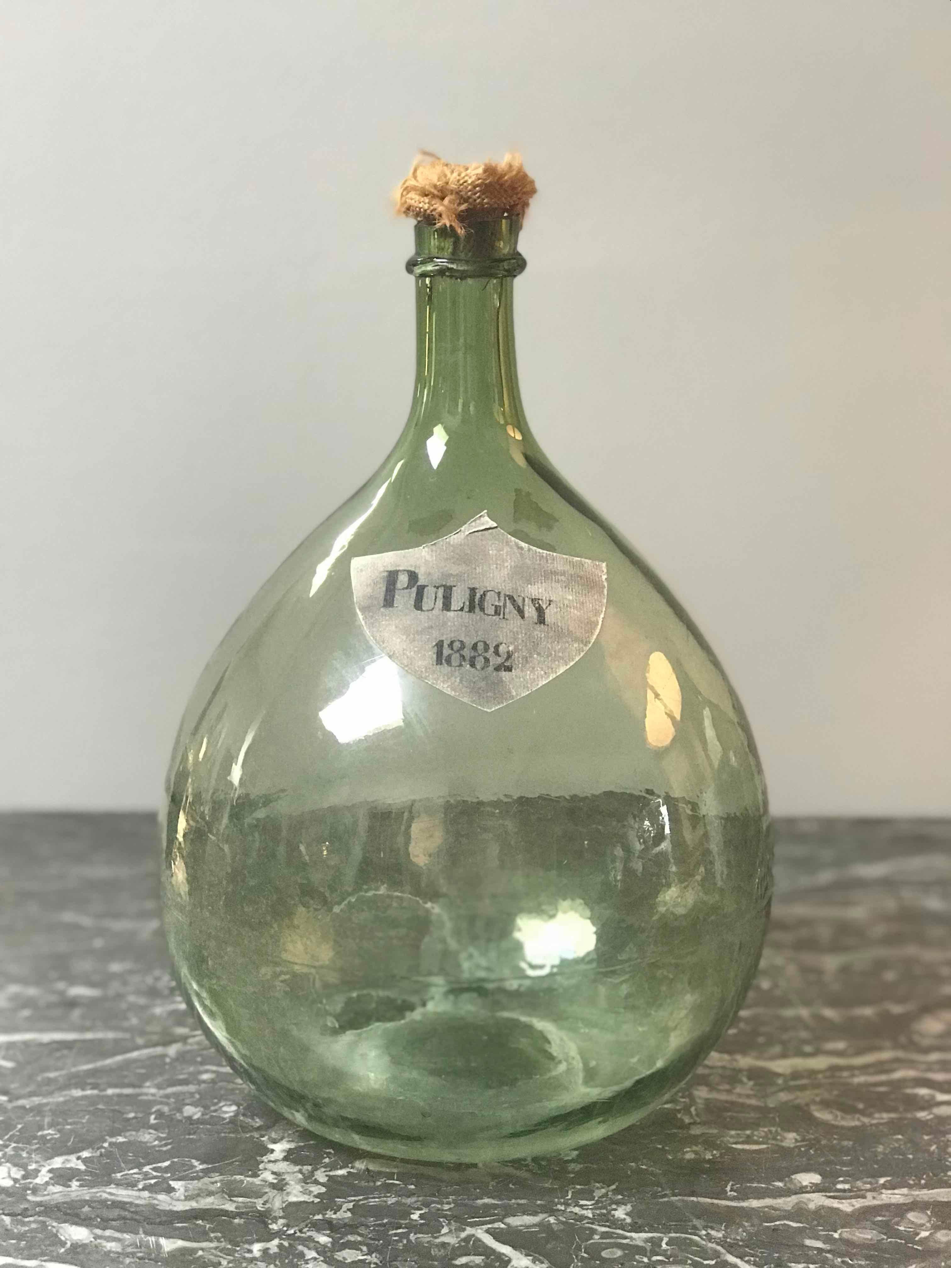 Green blown glass bottle with 