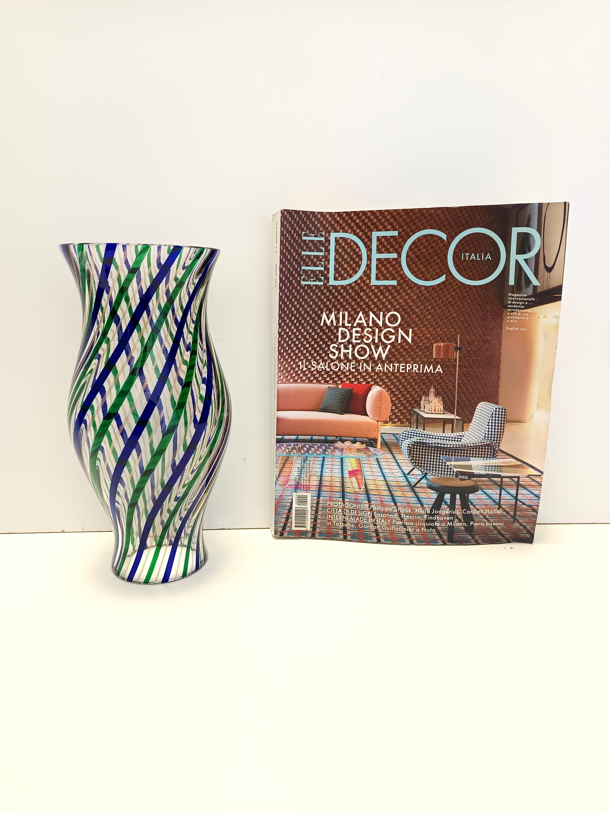 Made in Italy, 1990s. 
This tulip vase is made with three-colored Murano hand-blown glass canes.
It can also be used as a candleholder. 
It is a vintage piece, therefore it might show slight traces of use, but it can be considered as in perfect