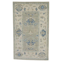 Handgewebter türkischer Oushak-Teppich aus Wolle in Grün & Blau mit Blumenmuster 3'8" x 5'10"